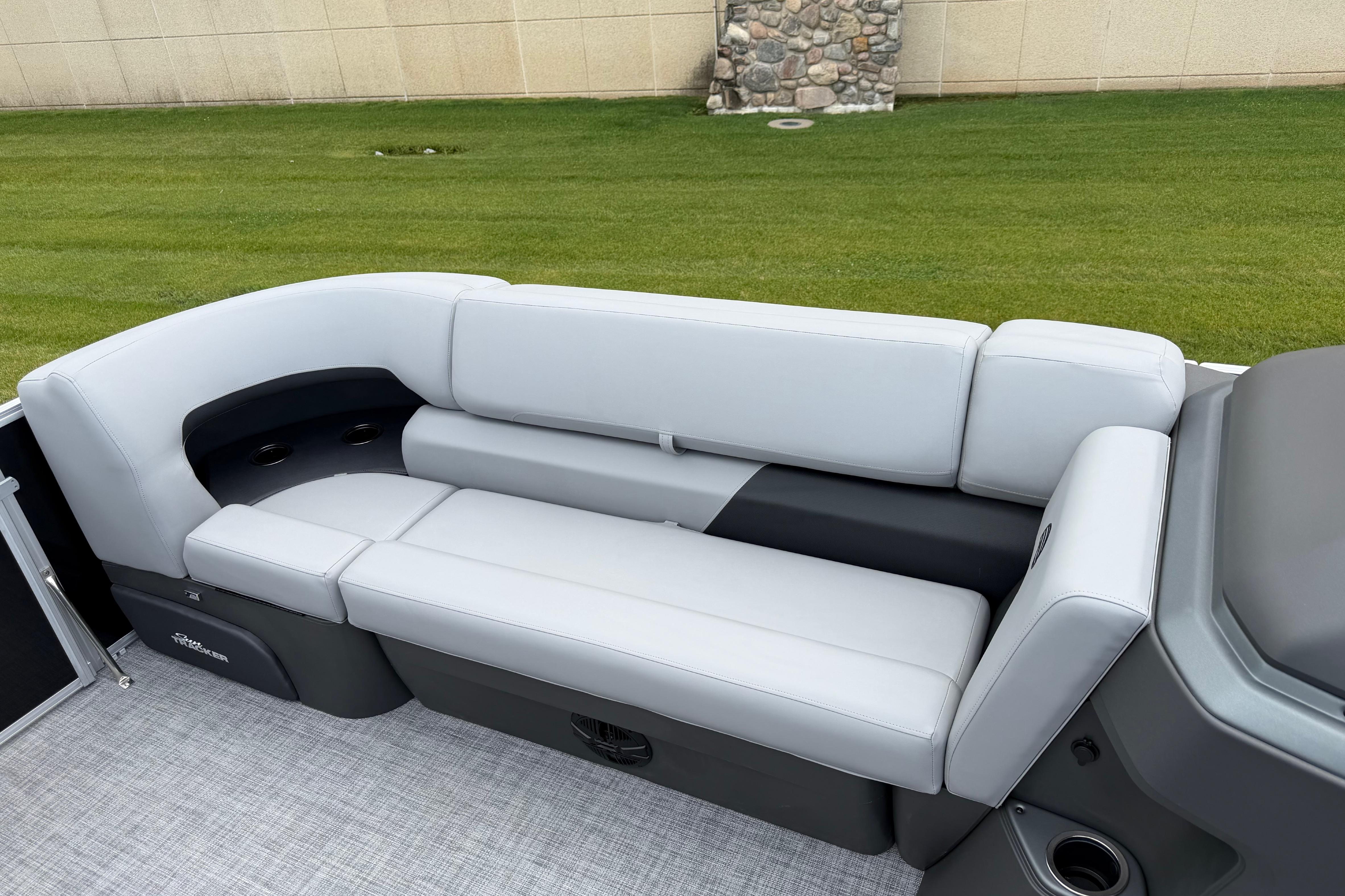 2026 Sun Tracker Party Barge 20 DLX interior seating with gray upholstery.