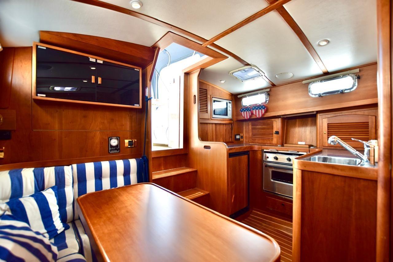 Interior of 2001 Sabre 36 Express yacht with wood finish and modern amenities.