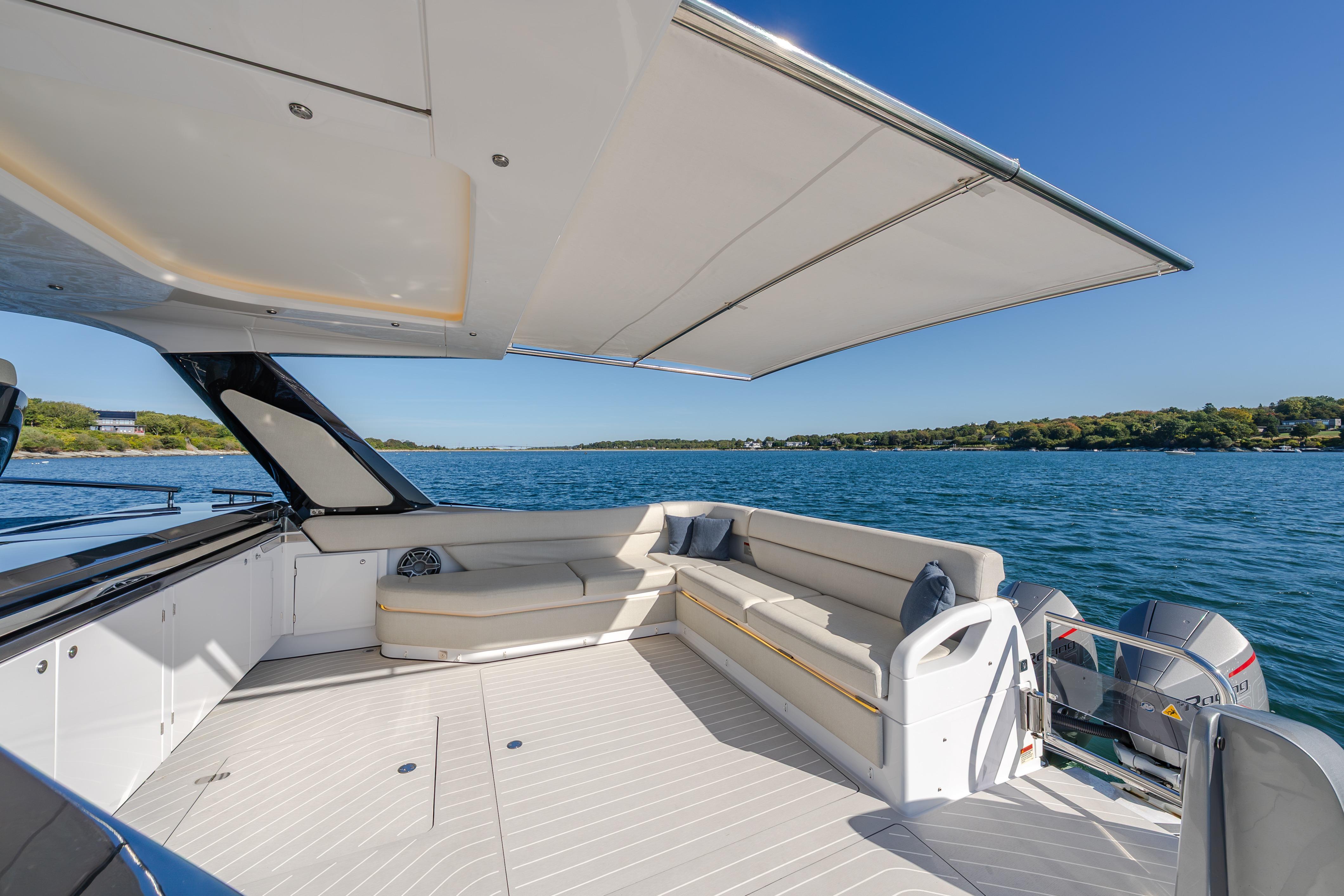 Luxurious 2023 Azimut Verve 47 yacht with spacious deck and scenic ocean view.