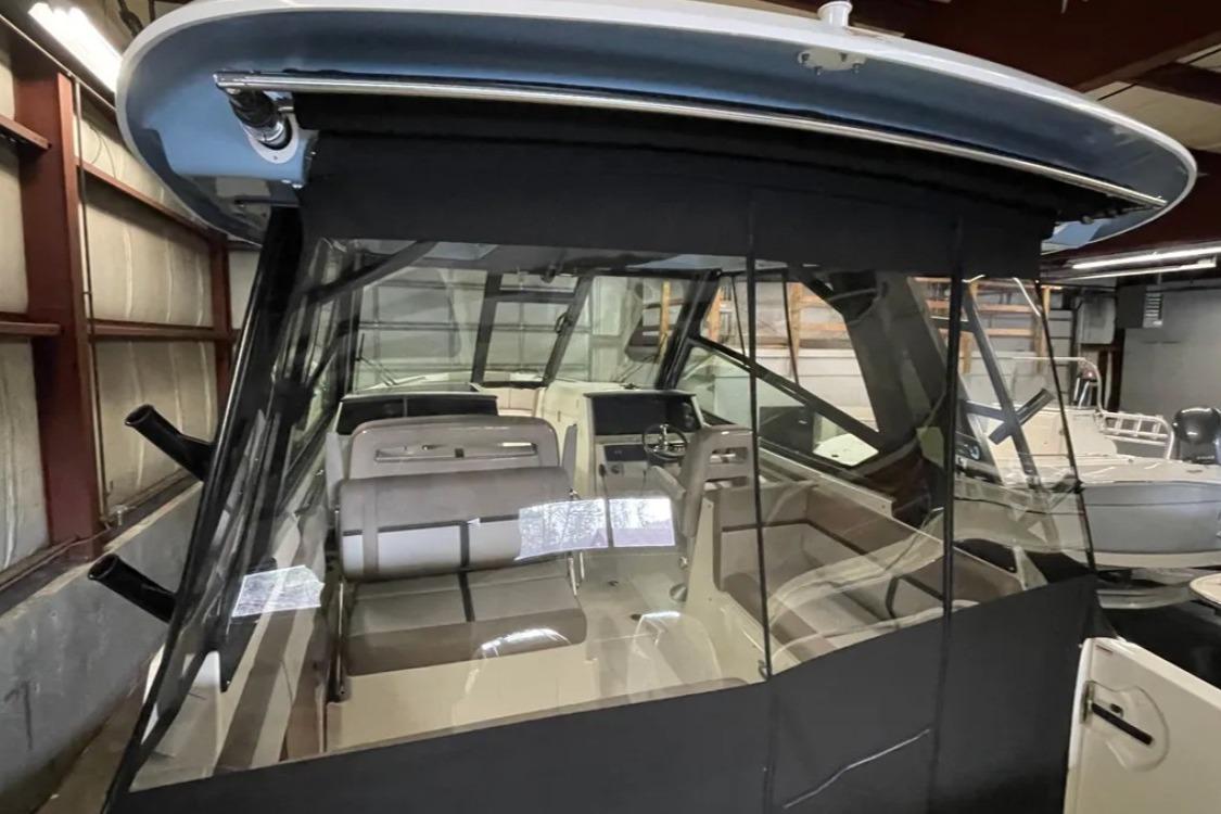 2025 Boston Whaler 330 Vantage boat interior with modern helm and seating.