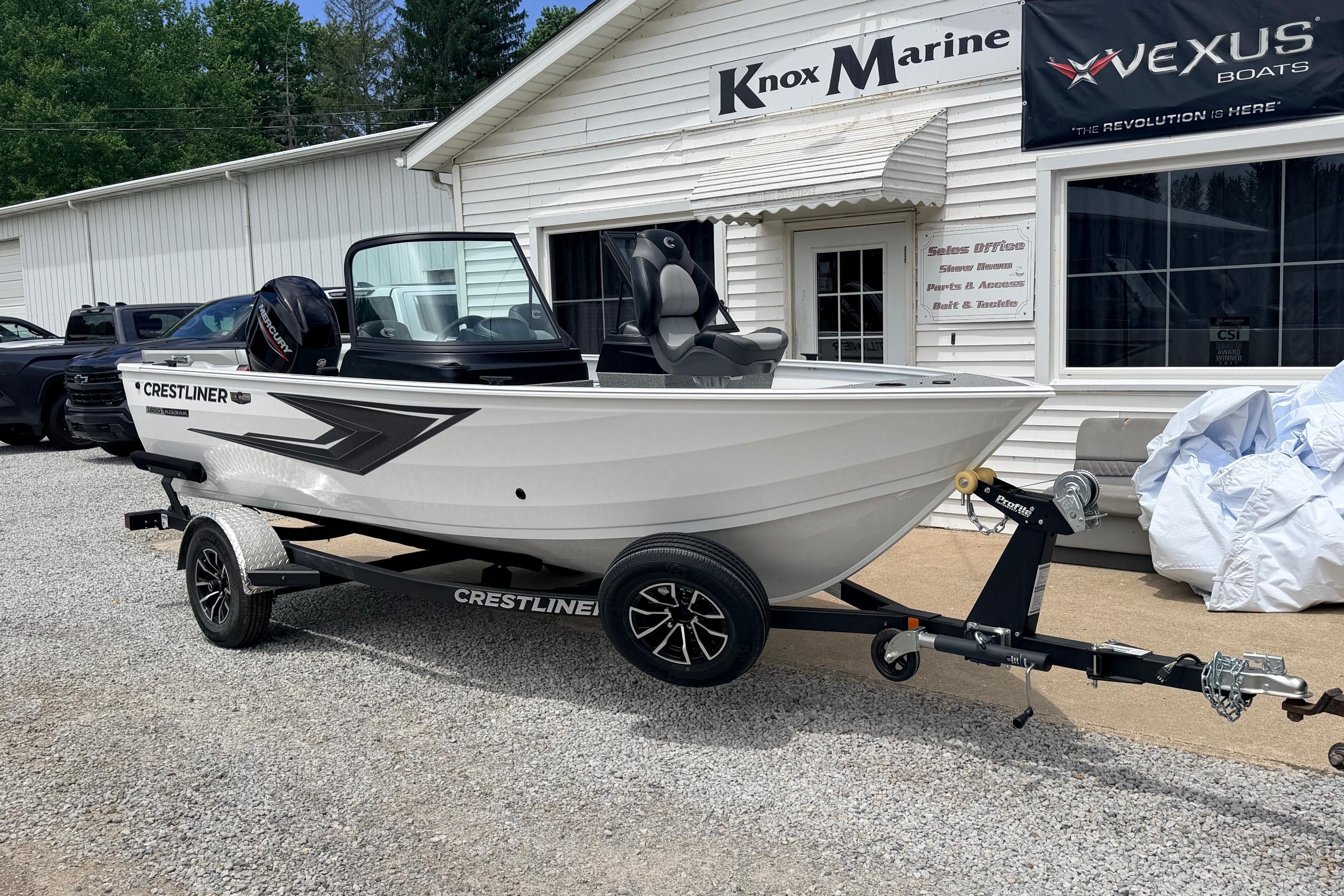 2026 Crestliner 1650 Kodiak WT boat on trailer outside Knox Marine dealership.