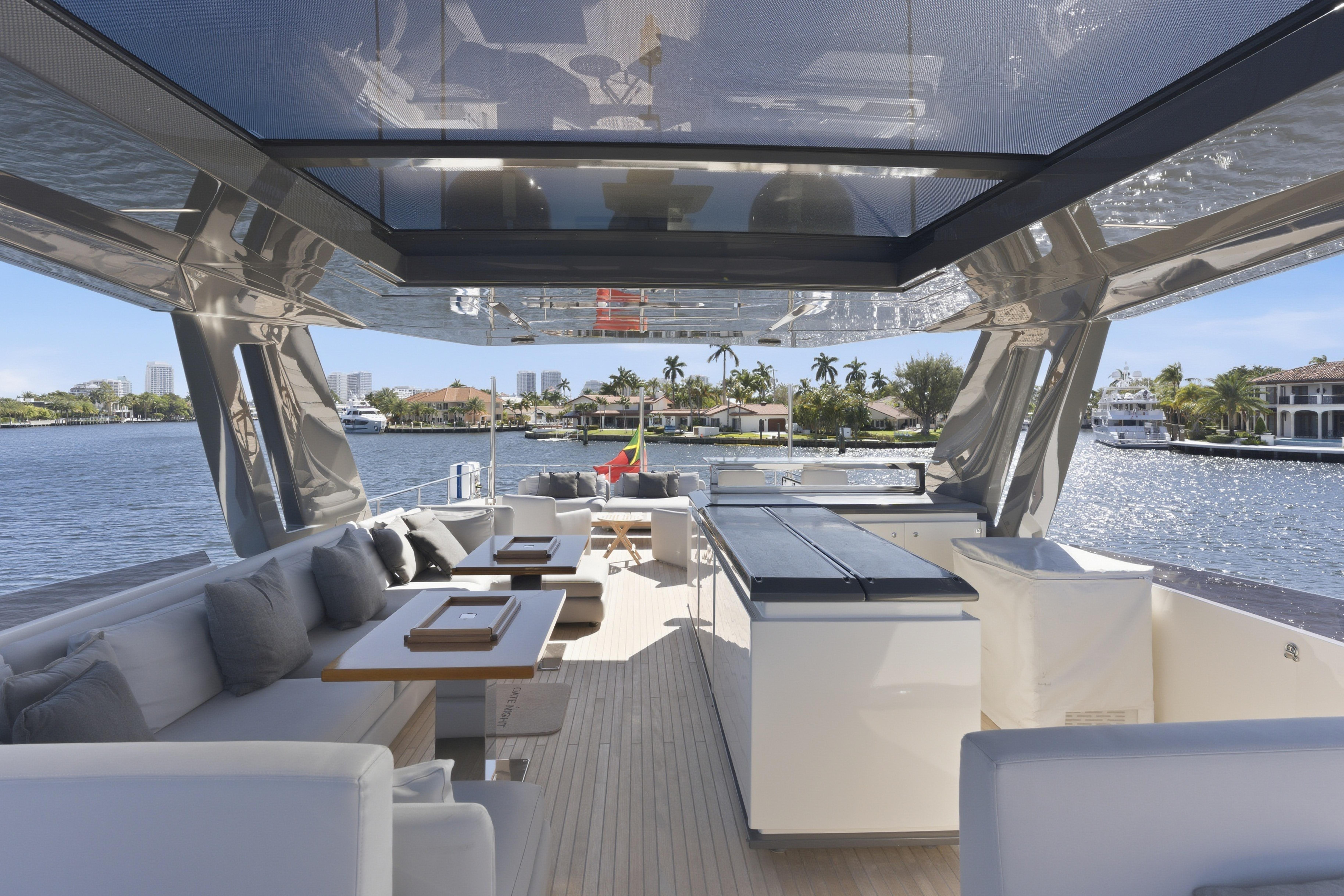 Luxurious 2018 Ferretti Yachts 920 with spacious deck and elegant seating area.