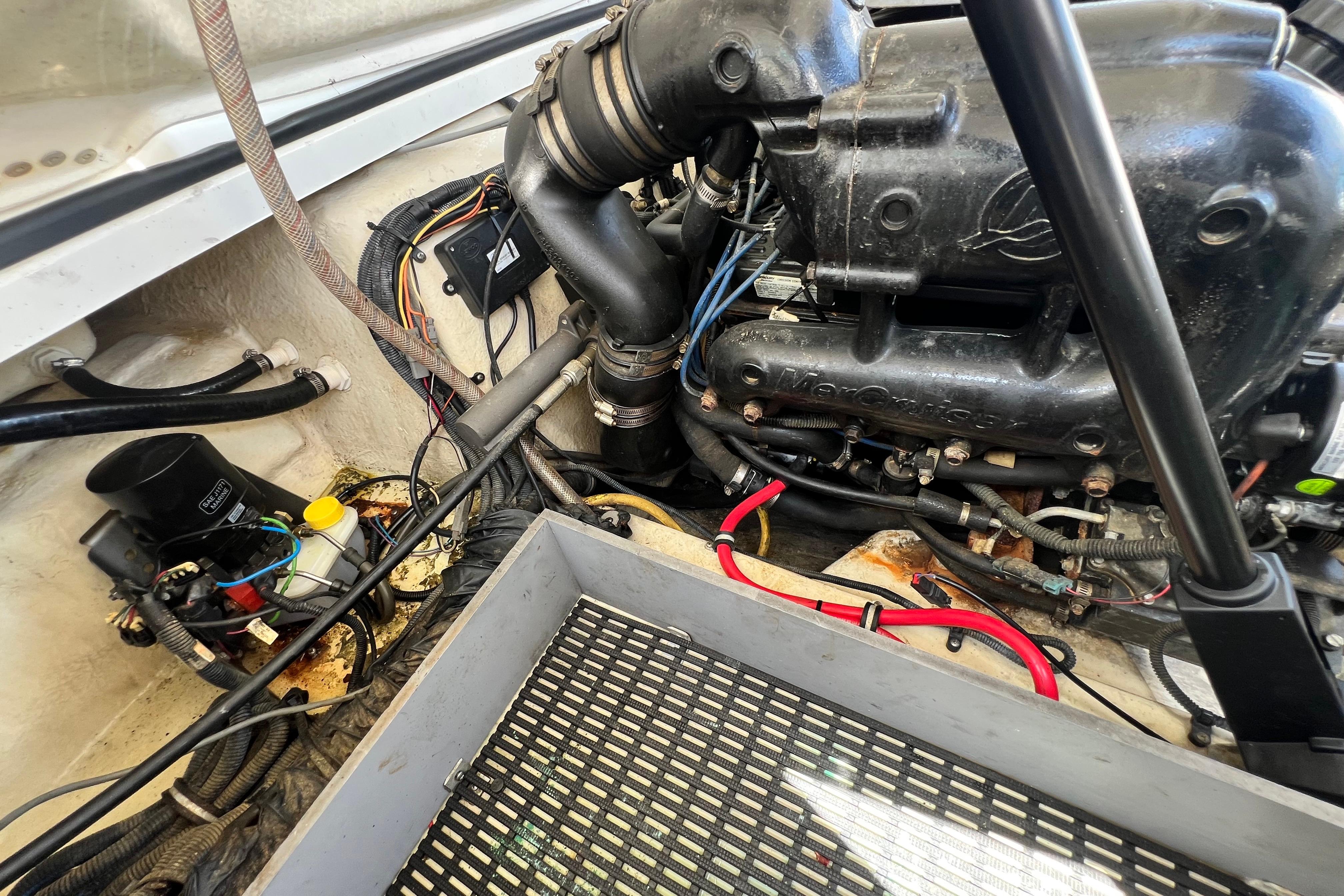 Engine compartment of a 2015 Monterey 268SS Super Sport boat, showing mechanical components.