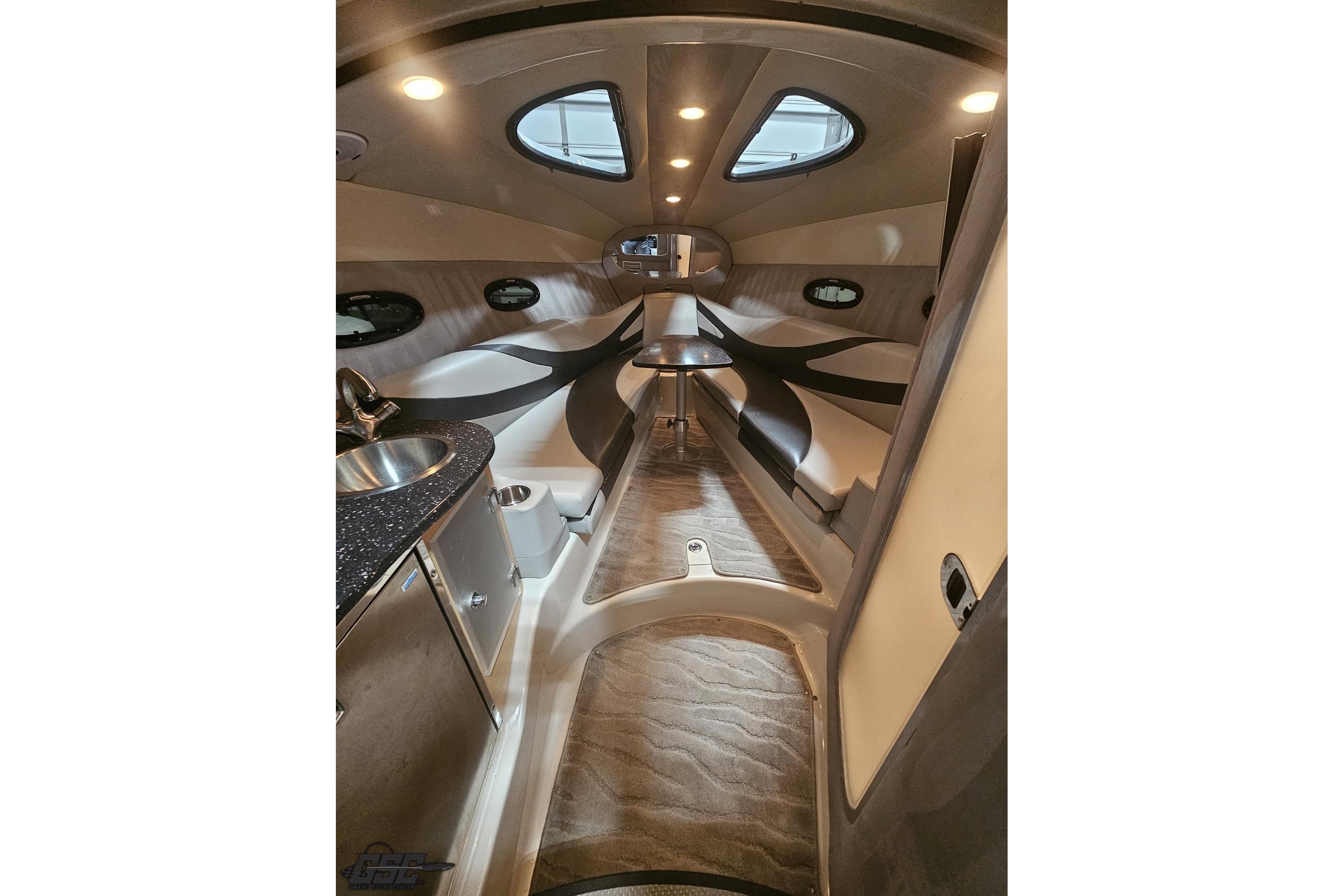 Interior of a 2008 Baja 335 Performance boat, featuring sleek design and modern amenities.