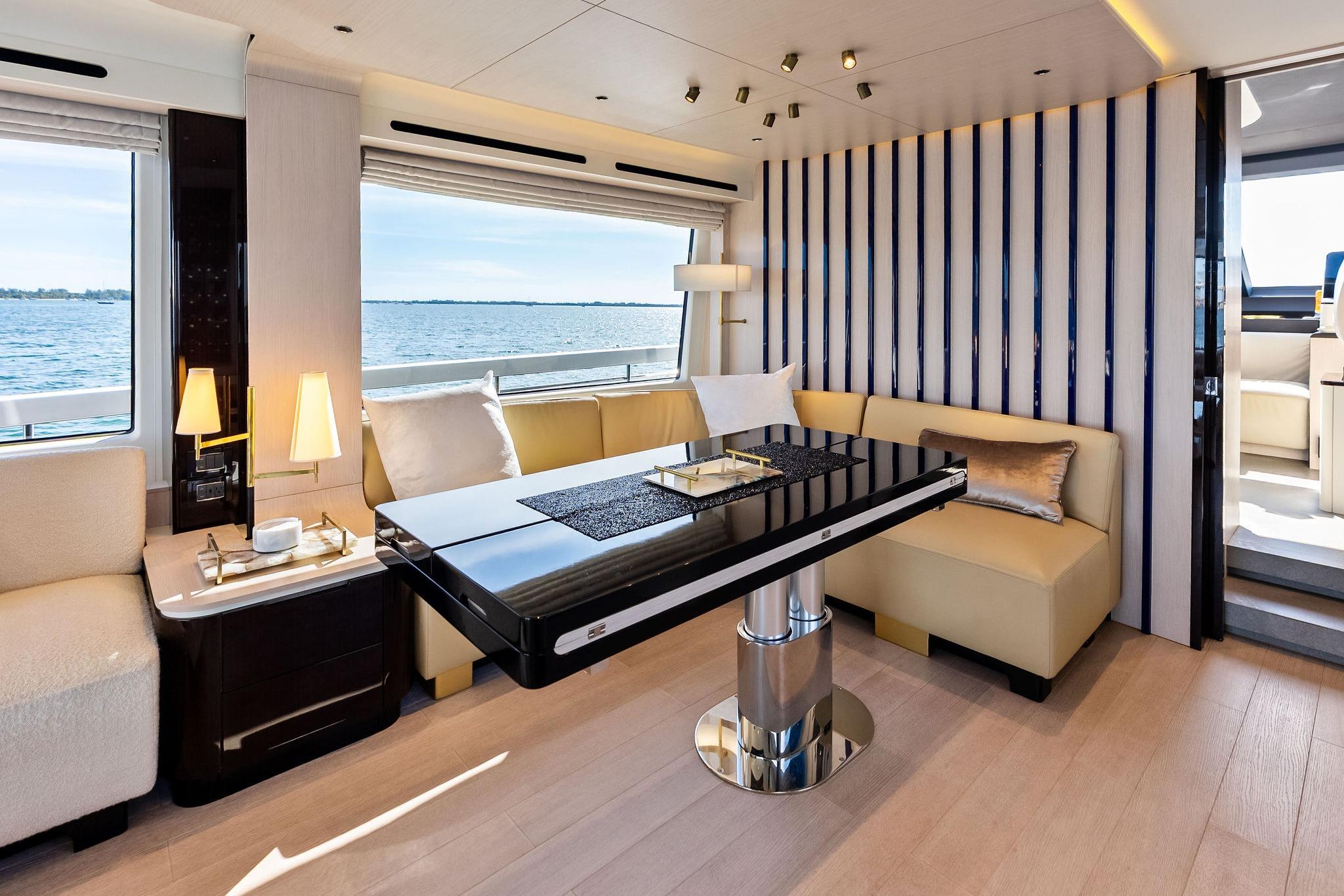 Luxurious interior of 2021 Azimut Fly 78 yacht with elegant seating and ocean view.