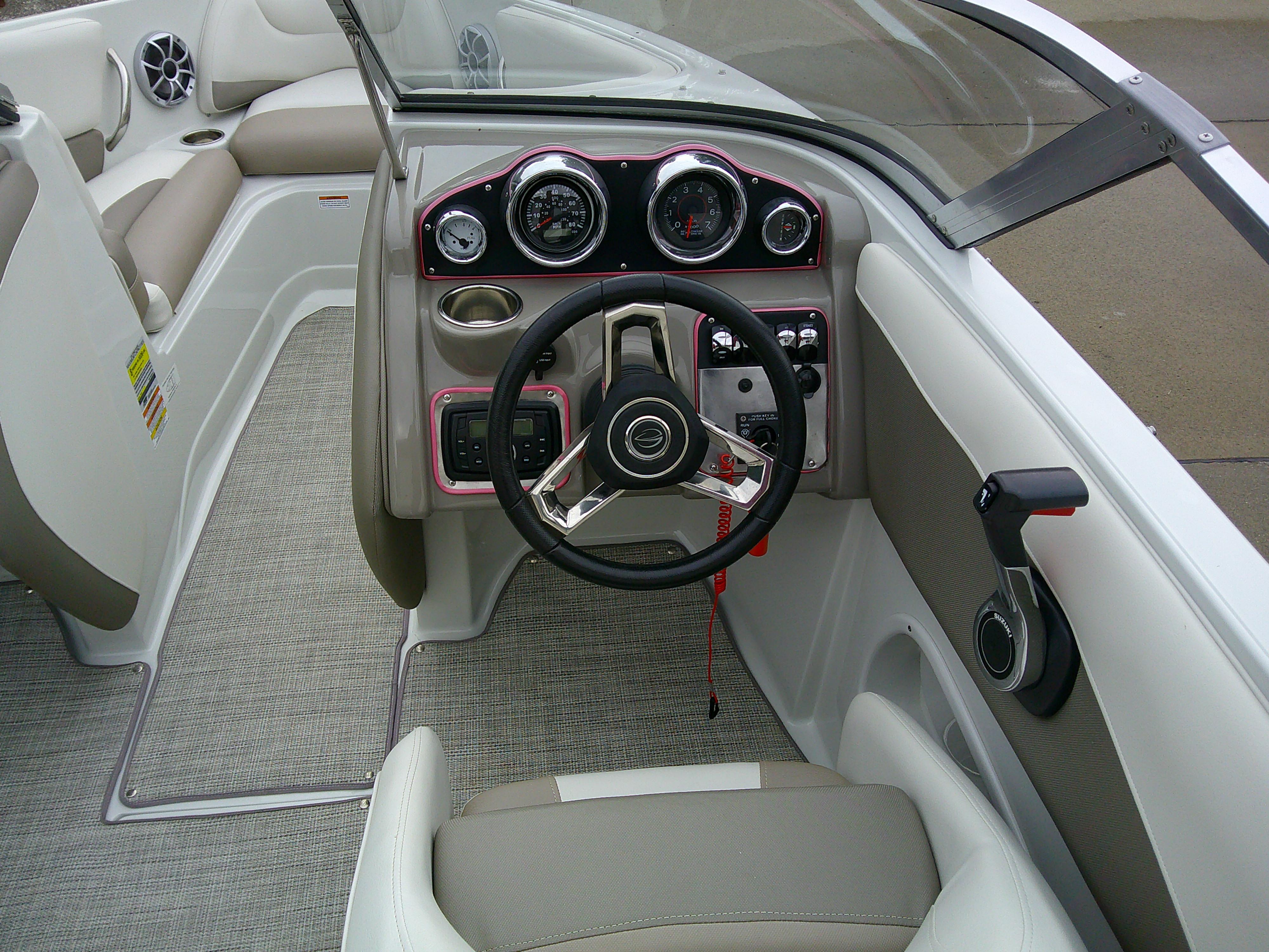 2019 Crownline 19 XS boat interior with steering wheel and dashboard controls.