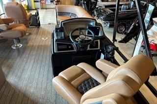 2026 Ranger 220FC boat interior with tan seating and modern dashboard.