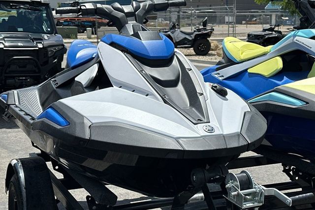 A Yamaha WaveRunner Jetblaster in black and blue is on a trailer.