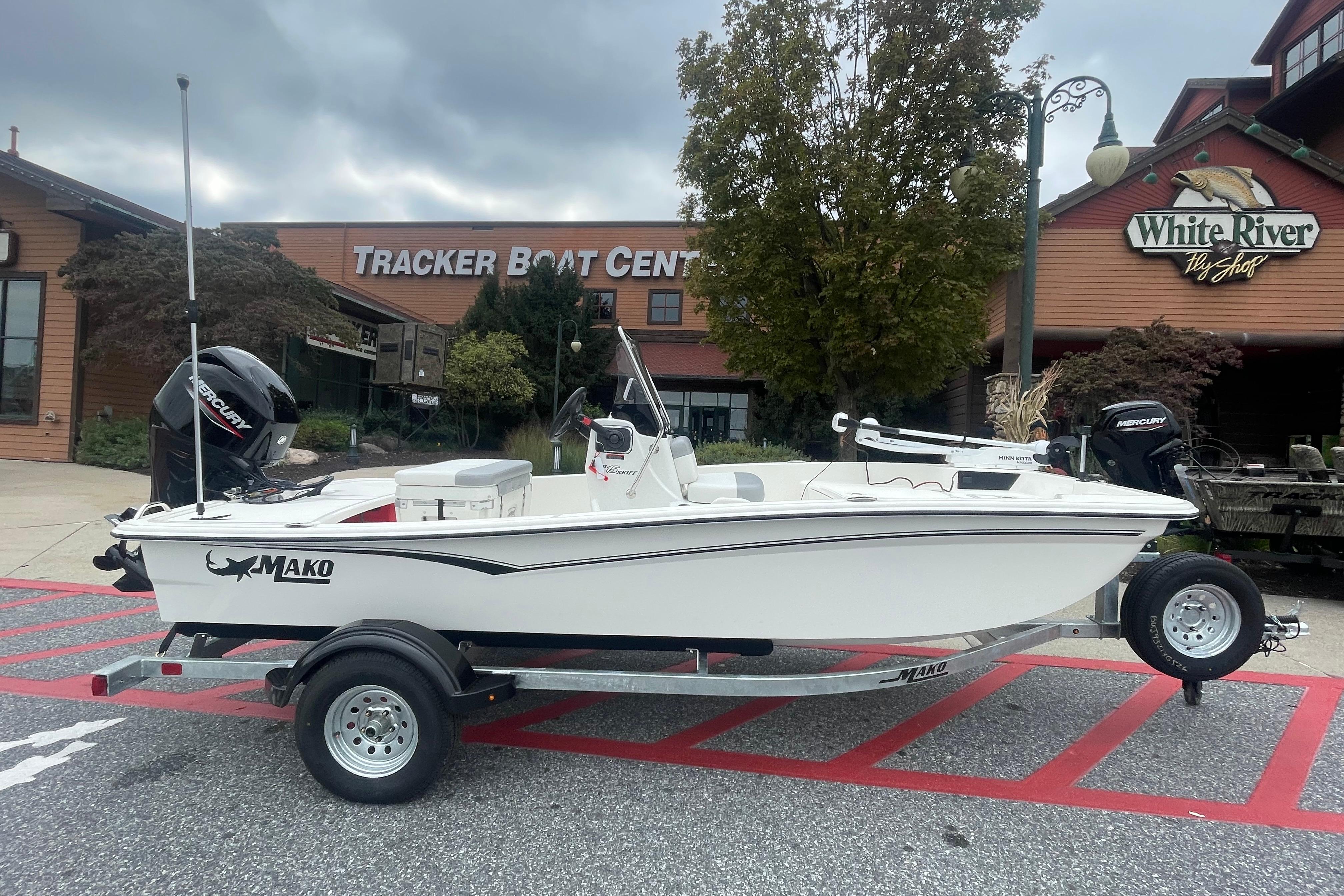 2026 Mako Pro Skiff 15 CC boat on trailer at Tracker Boat Center.