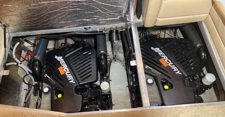 Two Mercury engines are visible in the engine room of a 2001 Cruisers Yachts 3750 Motoryacht.