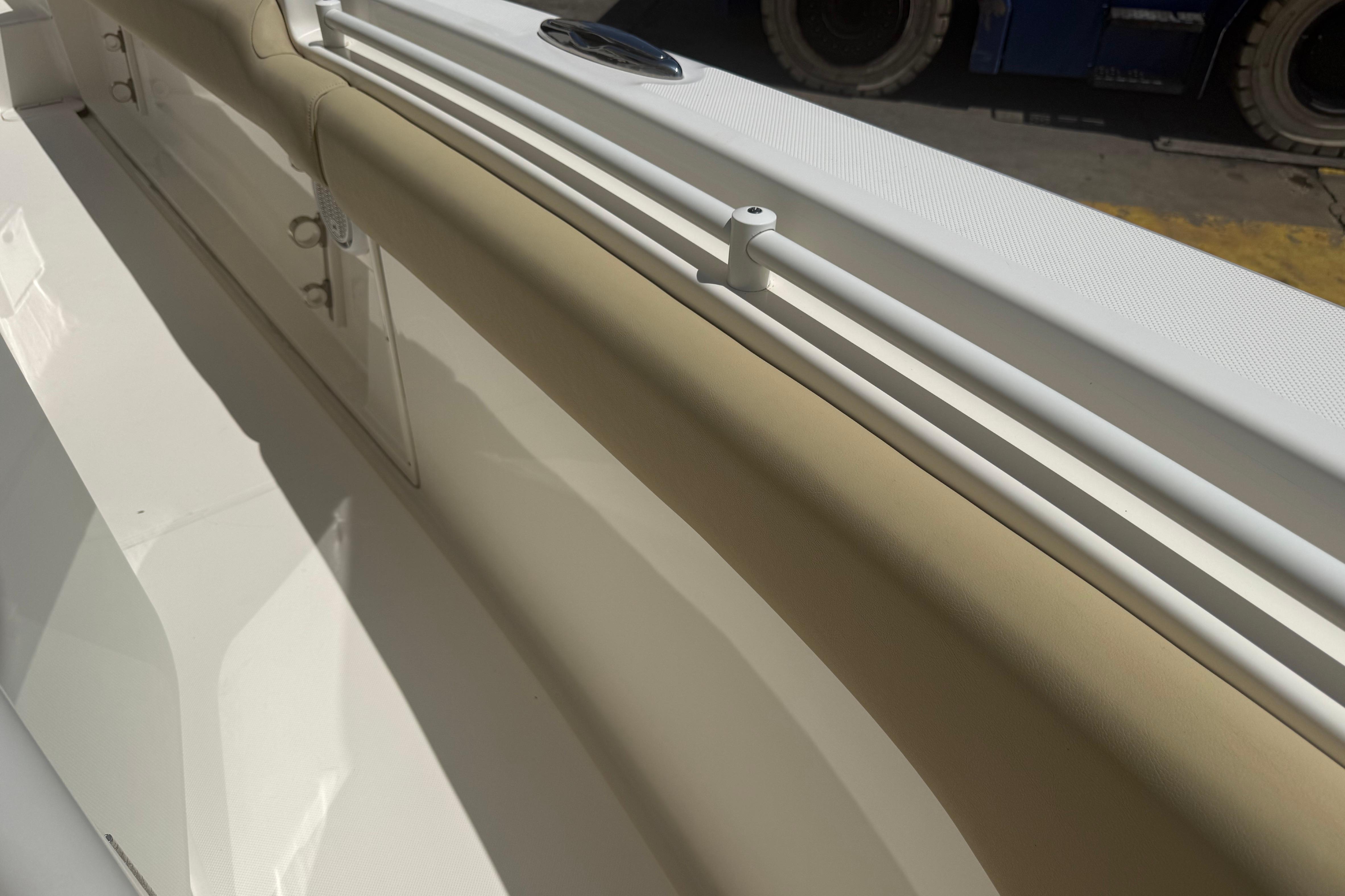 2019 Key West Billistic 281 Center Console interior detail, featuring beige and white upholstery.