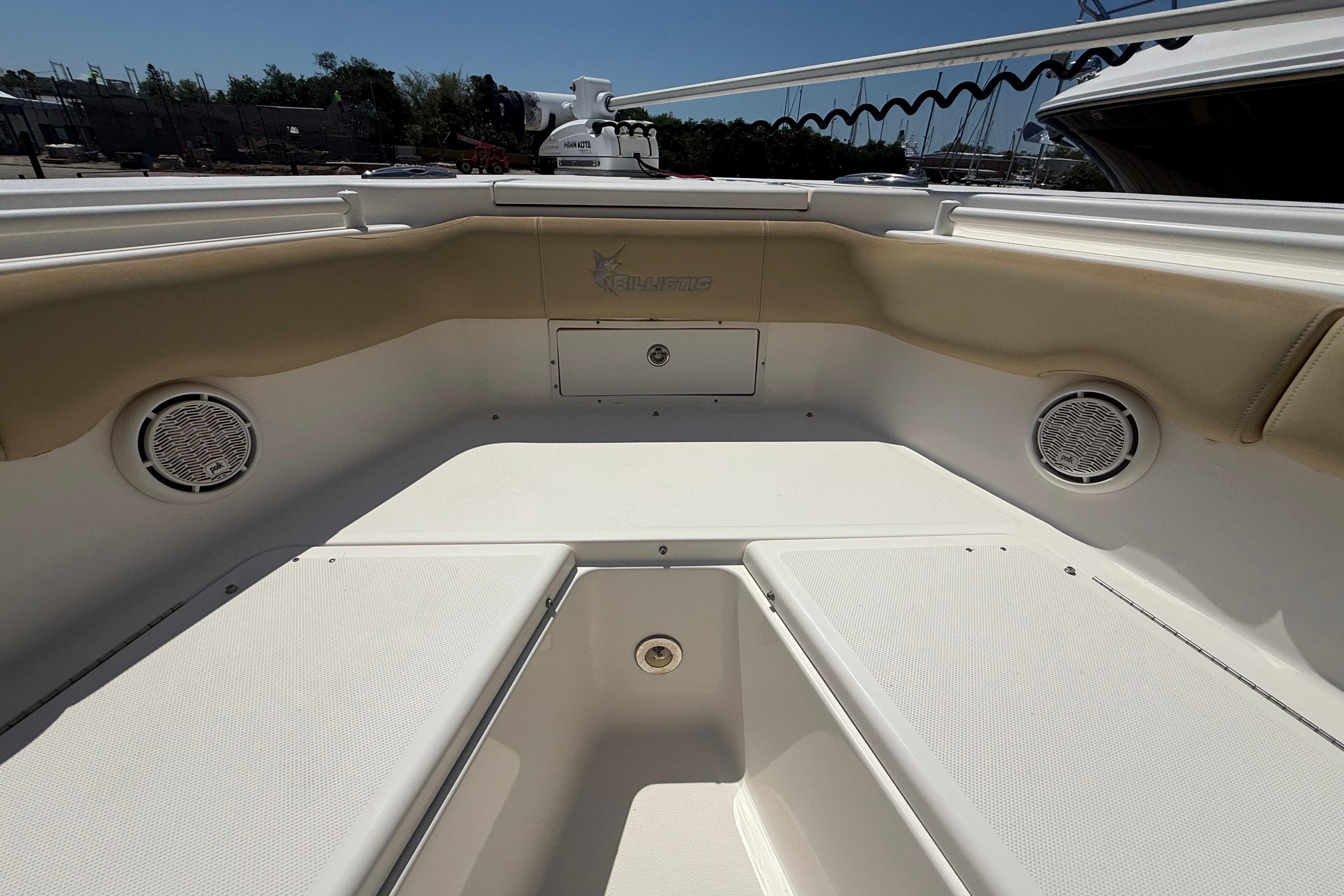 2019 Key West Billistic 281 Center Console boat interior with seating and speakers.