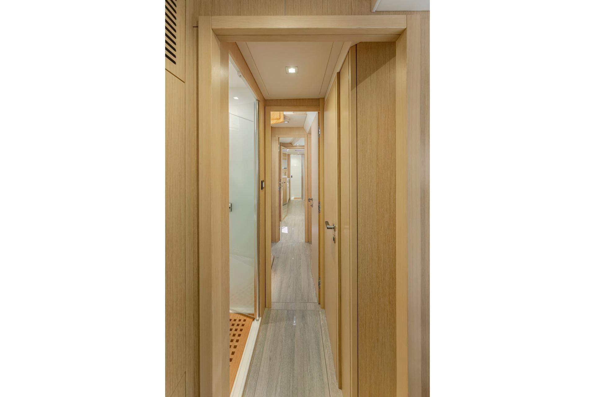 Interior of Privilege Signature 510, 2025 model, featuring wooden paneling.