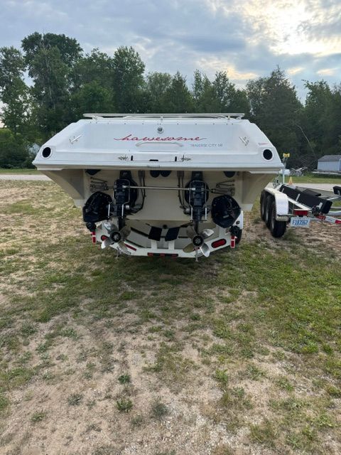 Rear view of a 2001 Fountain Lightning boat on a trailer.