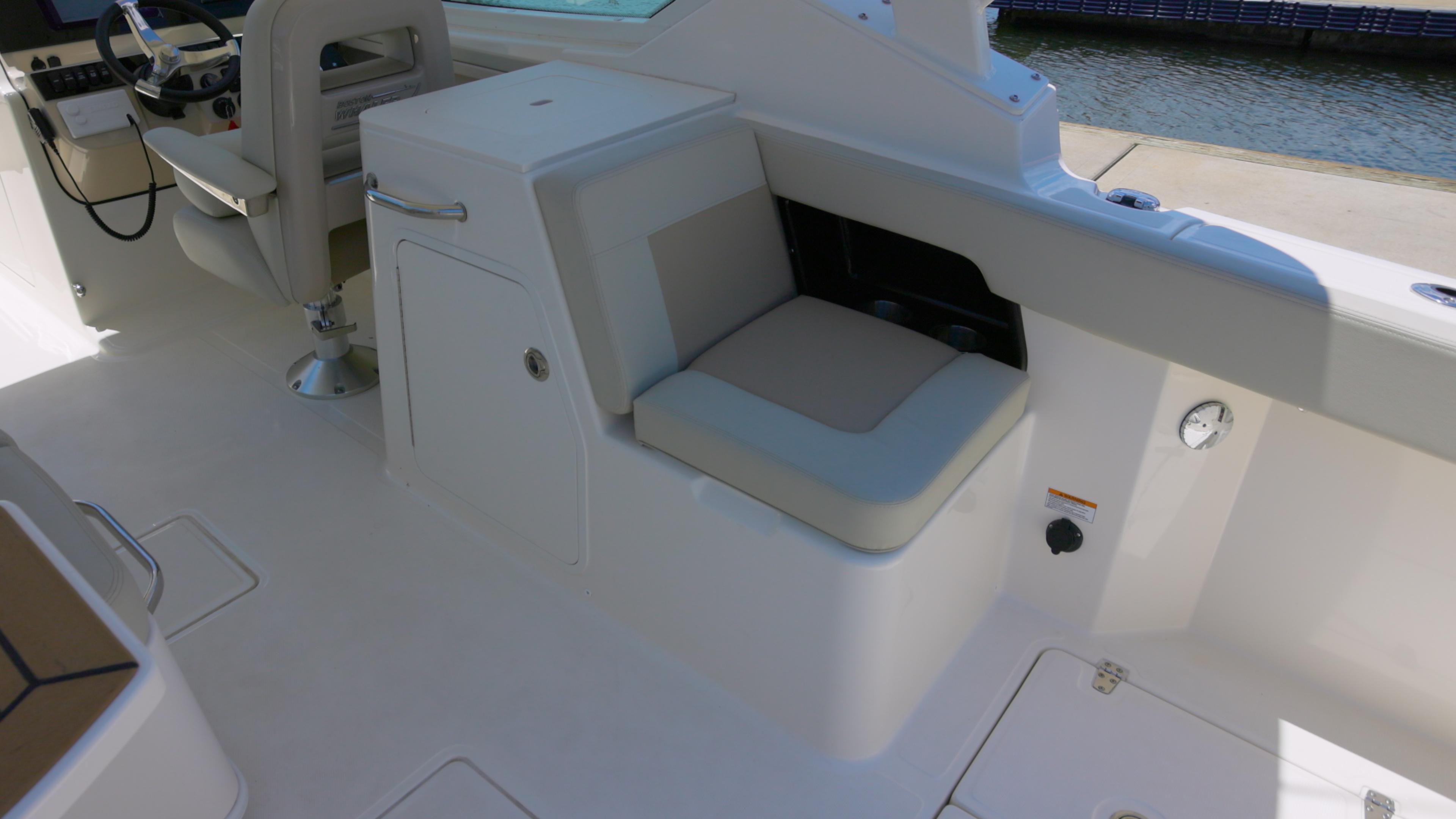 2024 Boston Whaler 280 Vantage interior seating and helm area.