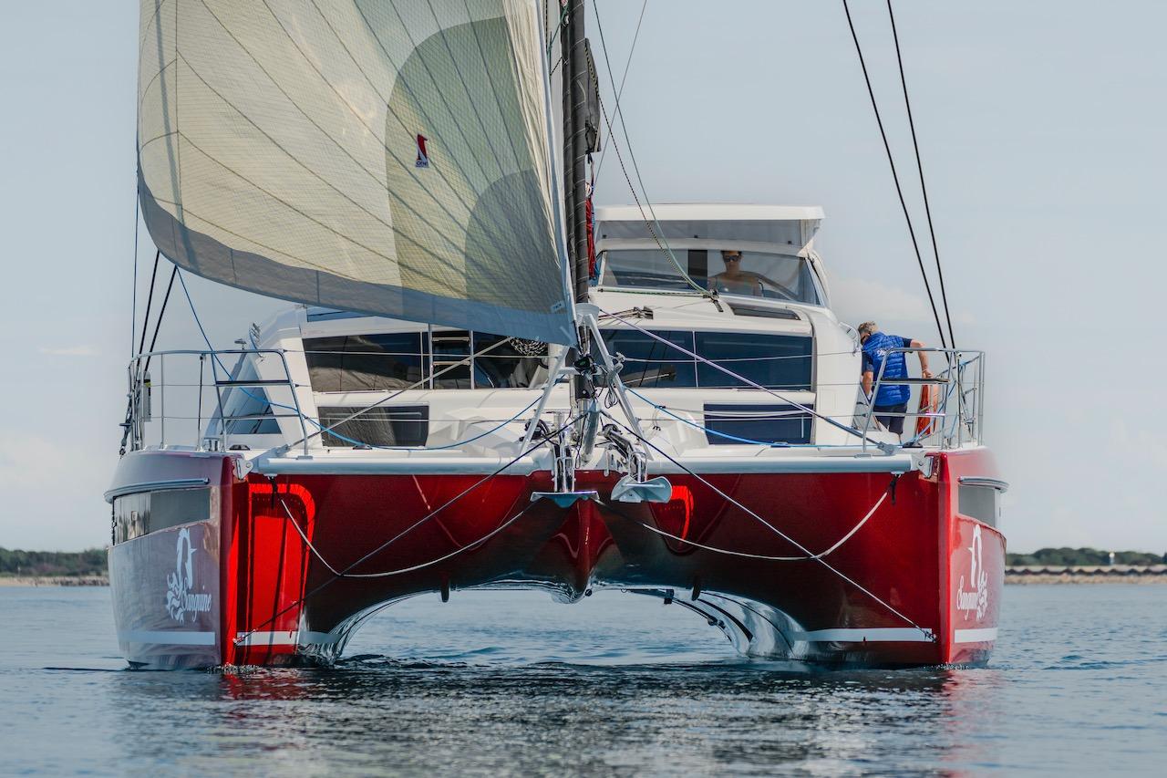 Privilege Signature 510 catamaran, 2025 model, sailing on calm waters.