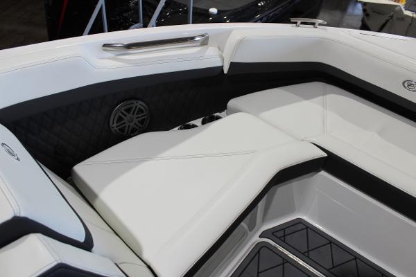 2025 Cobalt R6 boat interior with white leather seating and sleek design.