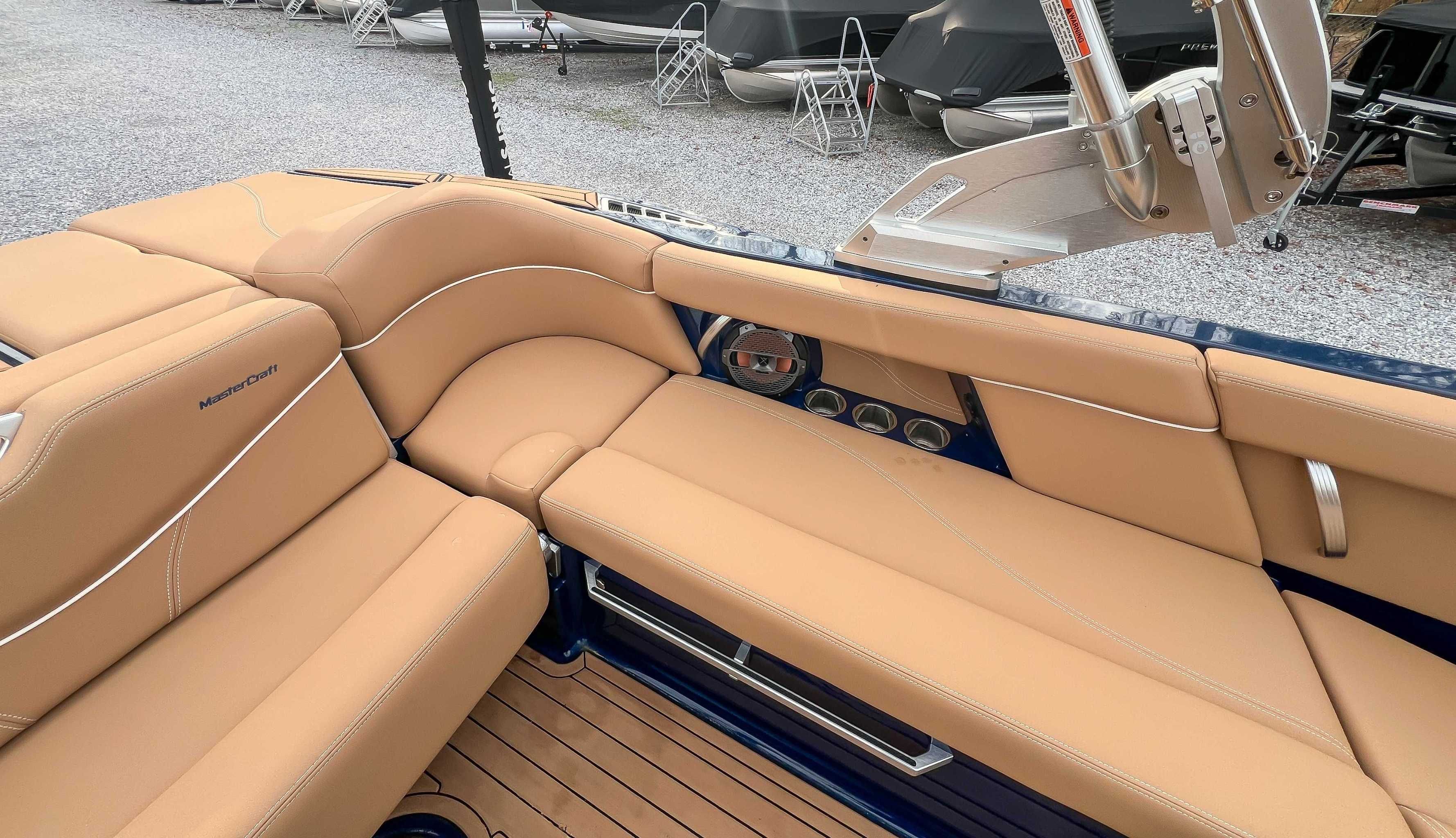 Interior of a 2021 MasterCraft XT22 with beige leather seating.