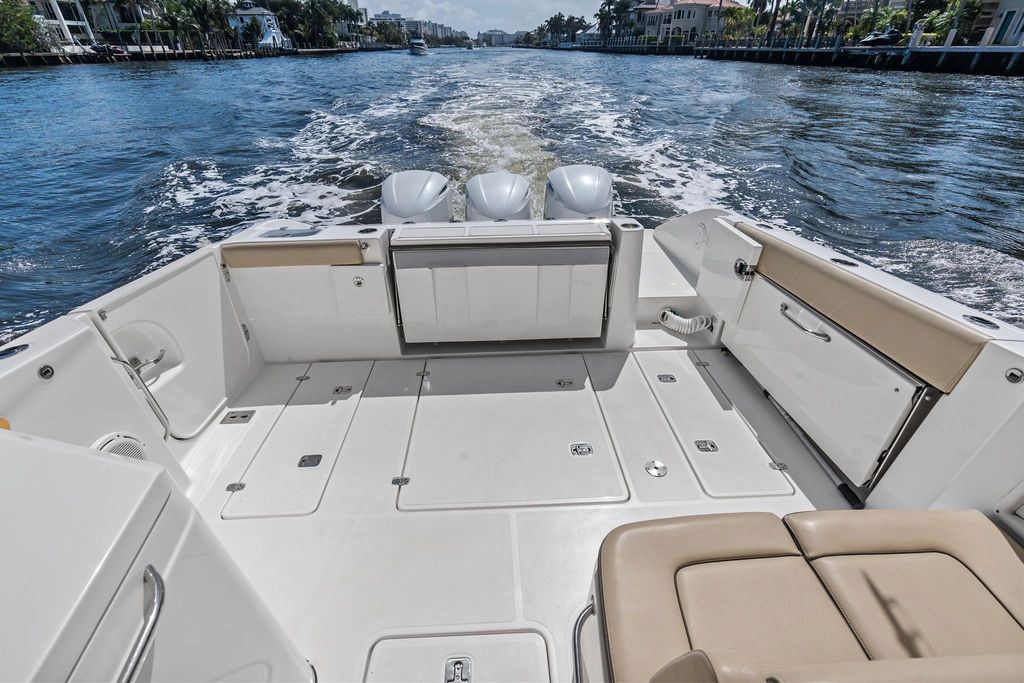 2019 Pursuit 365 DC boat on calm waters.
