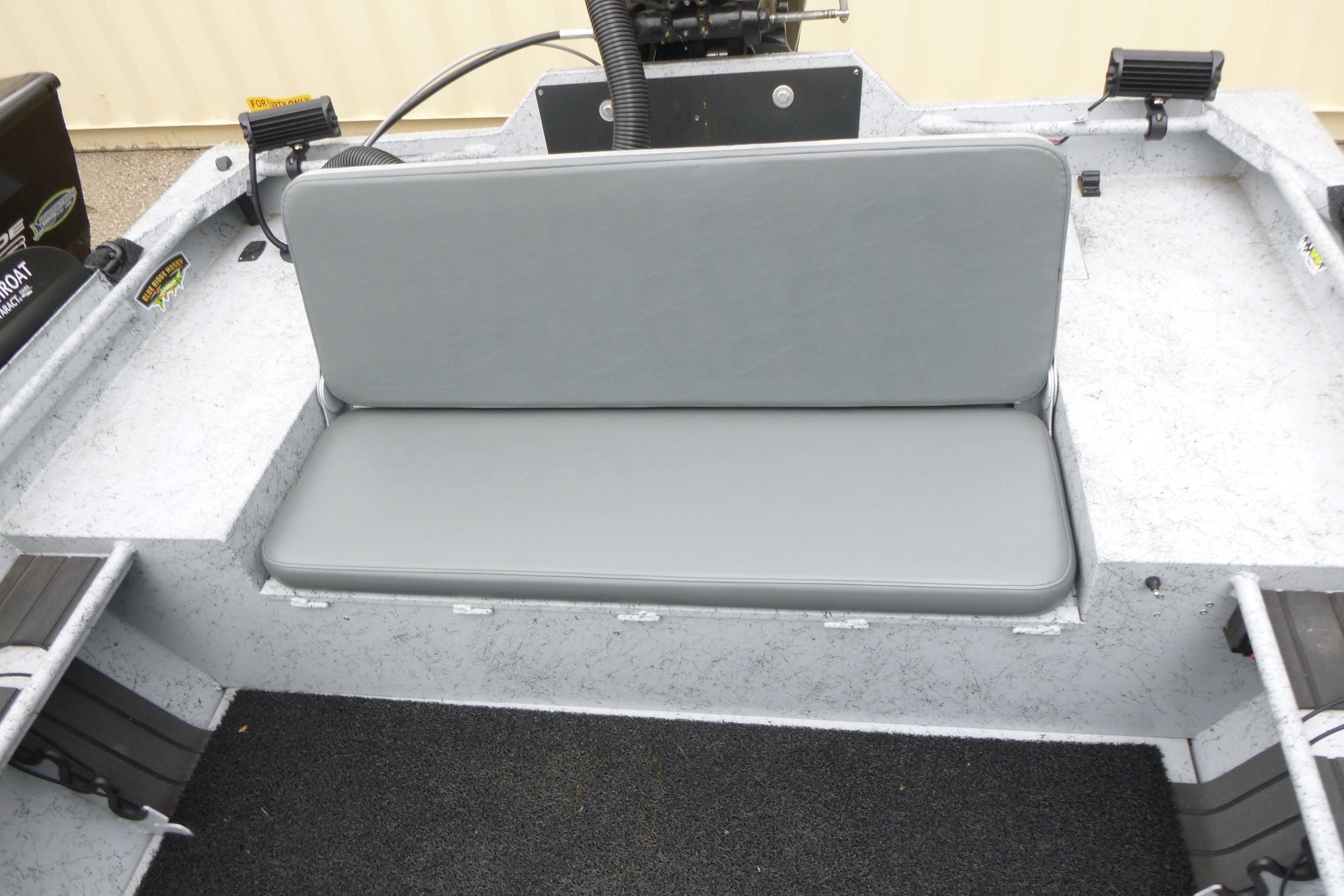 2025 StealthCraft 16 StealthWeld boat interior with gray cushioned seating.