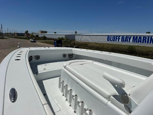 Freeman 42LR 2022 boat at Bluff Bay Marina, featuring spacious seating and rod holders.
