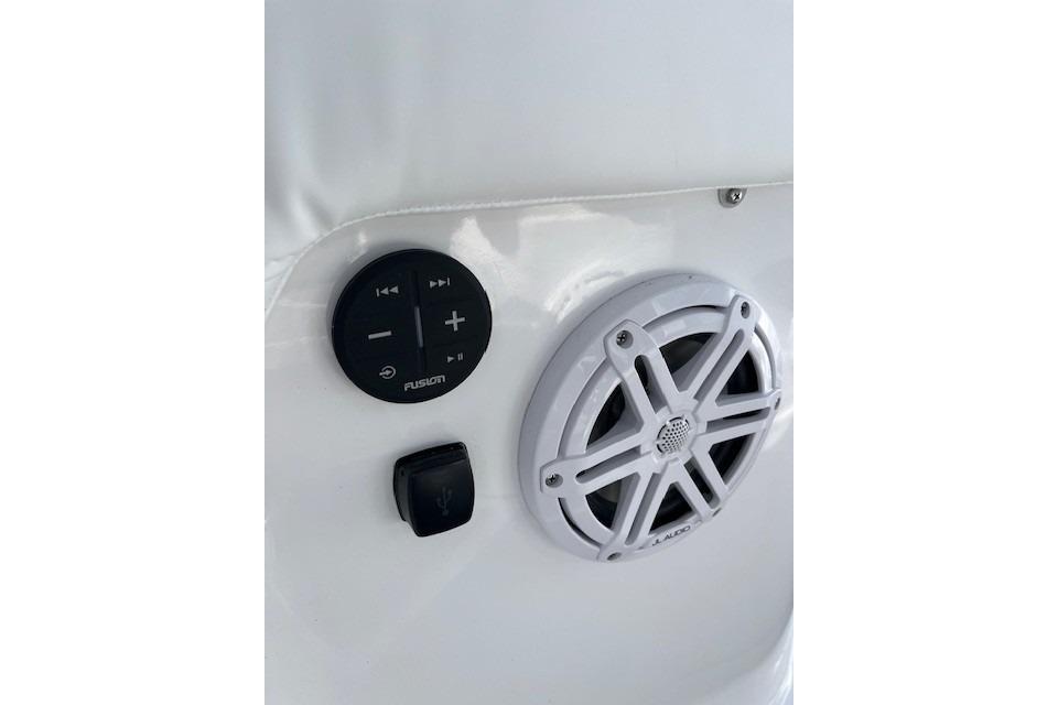 Audio controls and speaker on 2026 Monterey Elite 27 SD boat.