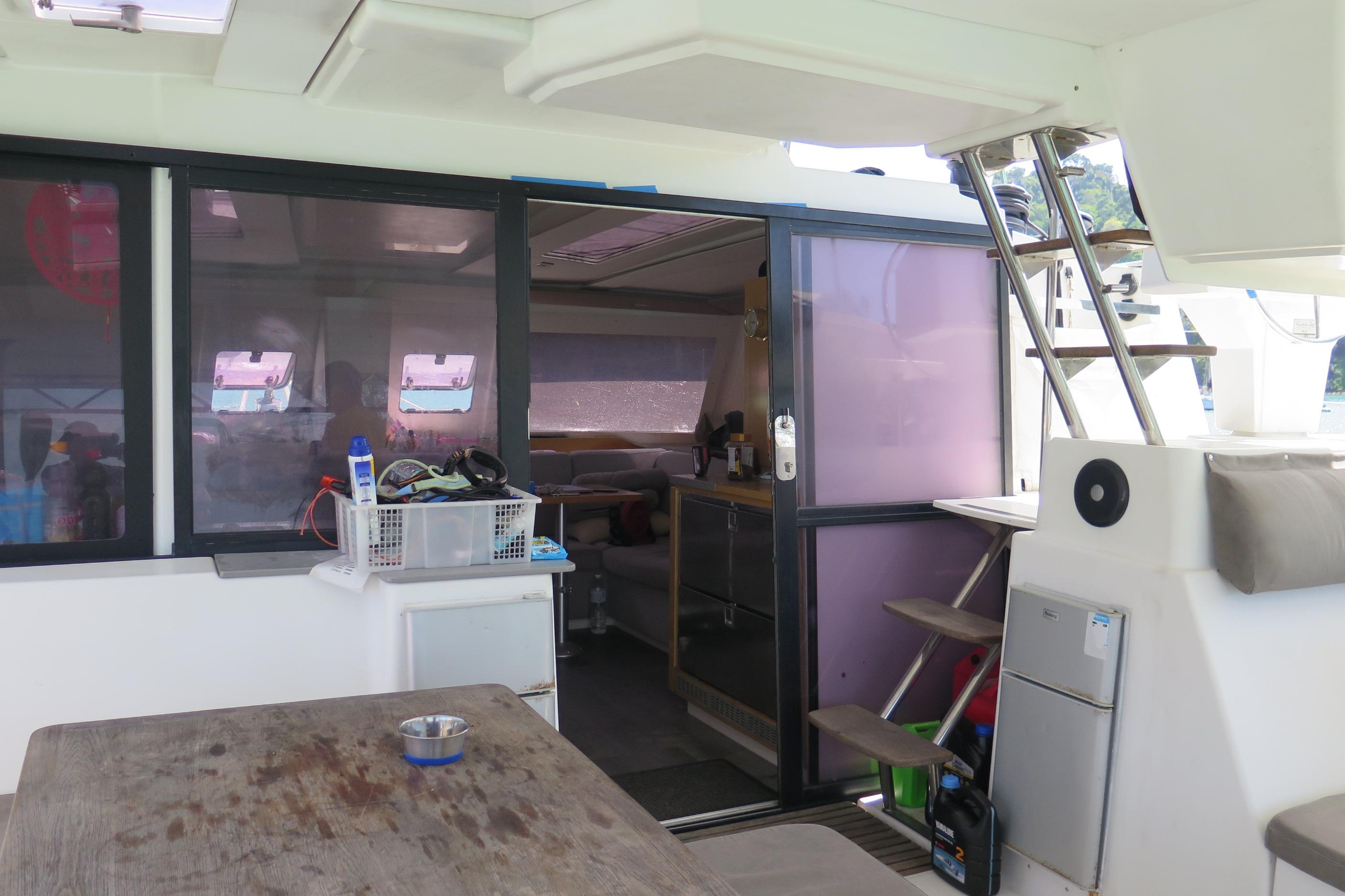 Interior view of 2013 Fountaine Pajot Helia 44 catamaran with seating and storage.