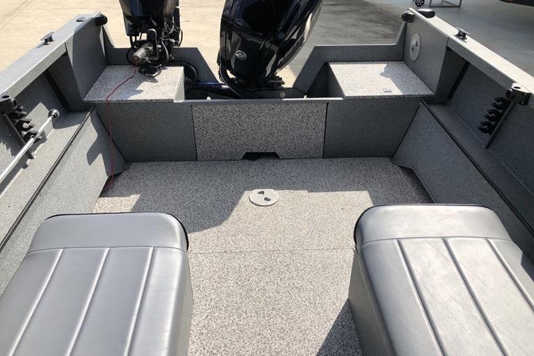 2023 Alumaweld Talon 18 boat interior with dual outboard motors and seating.