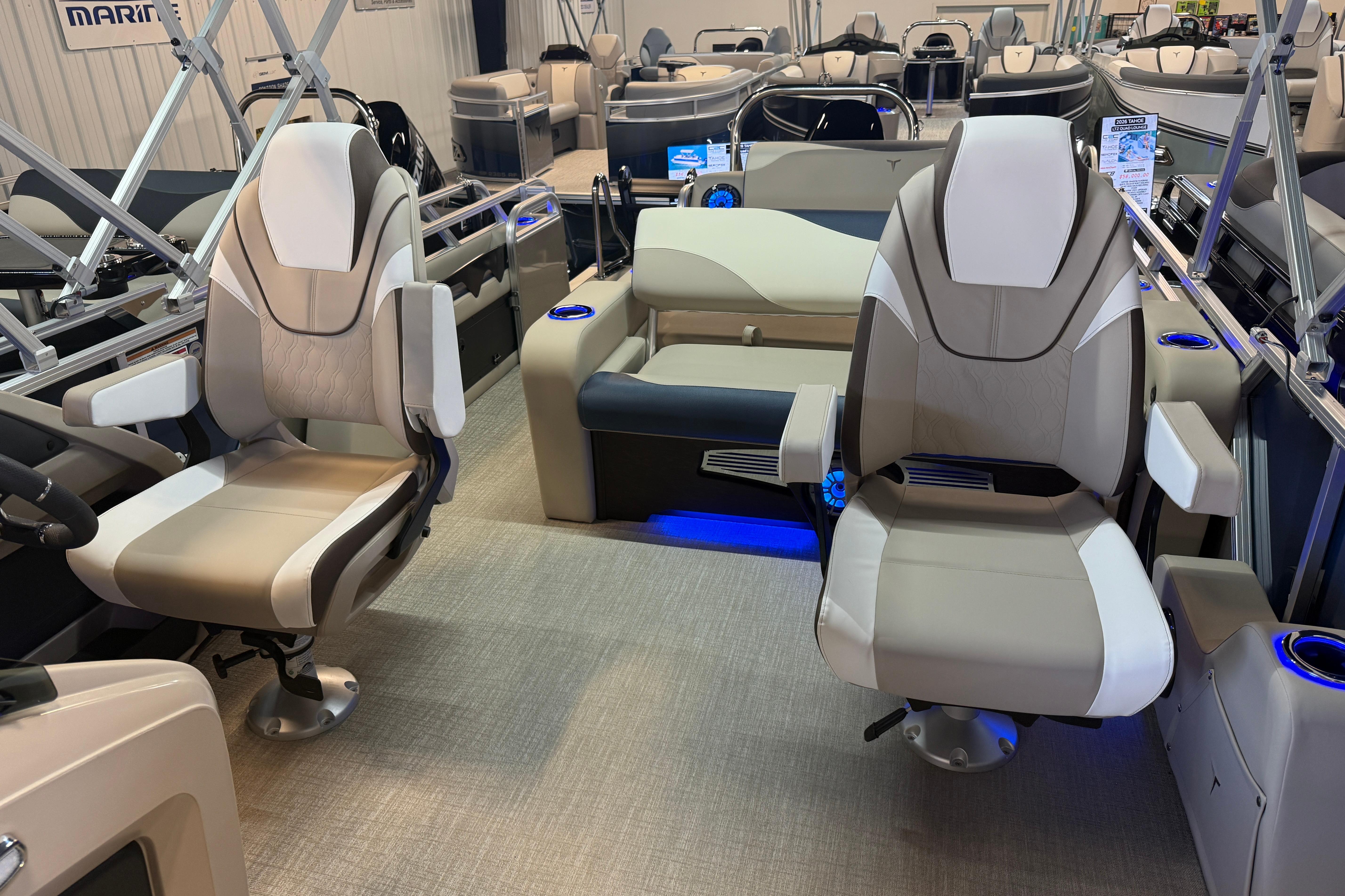 2026 Tahoe Pontoon LTZ Quad Lounger Shift interior with modern seating and ambient lighting.