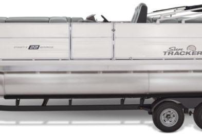 2026 Sun Tracker Party Barge 22 DLX pontoon boat on trailer, side view.