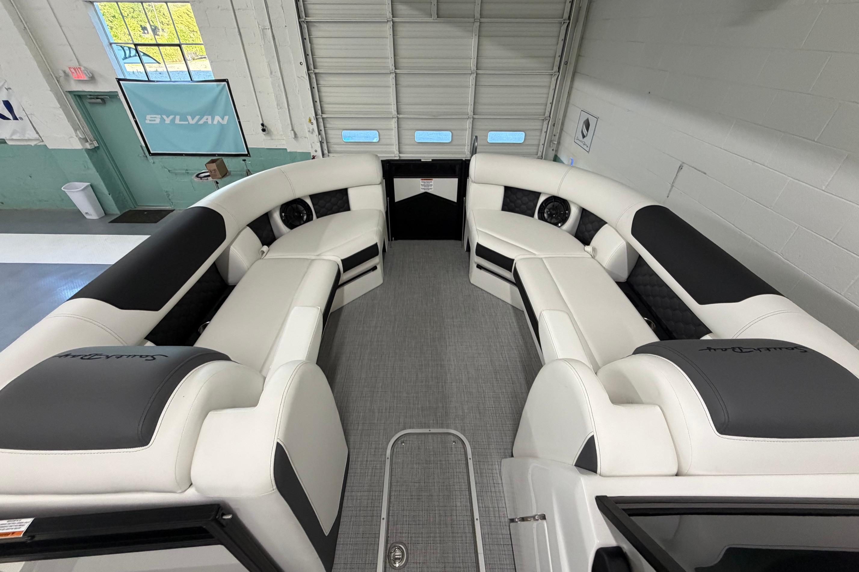 Luxurious interior of 2026 South Bay 525SB2 pontoon boat with plush seating.