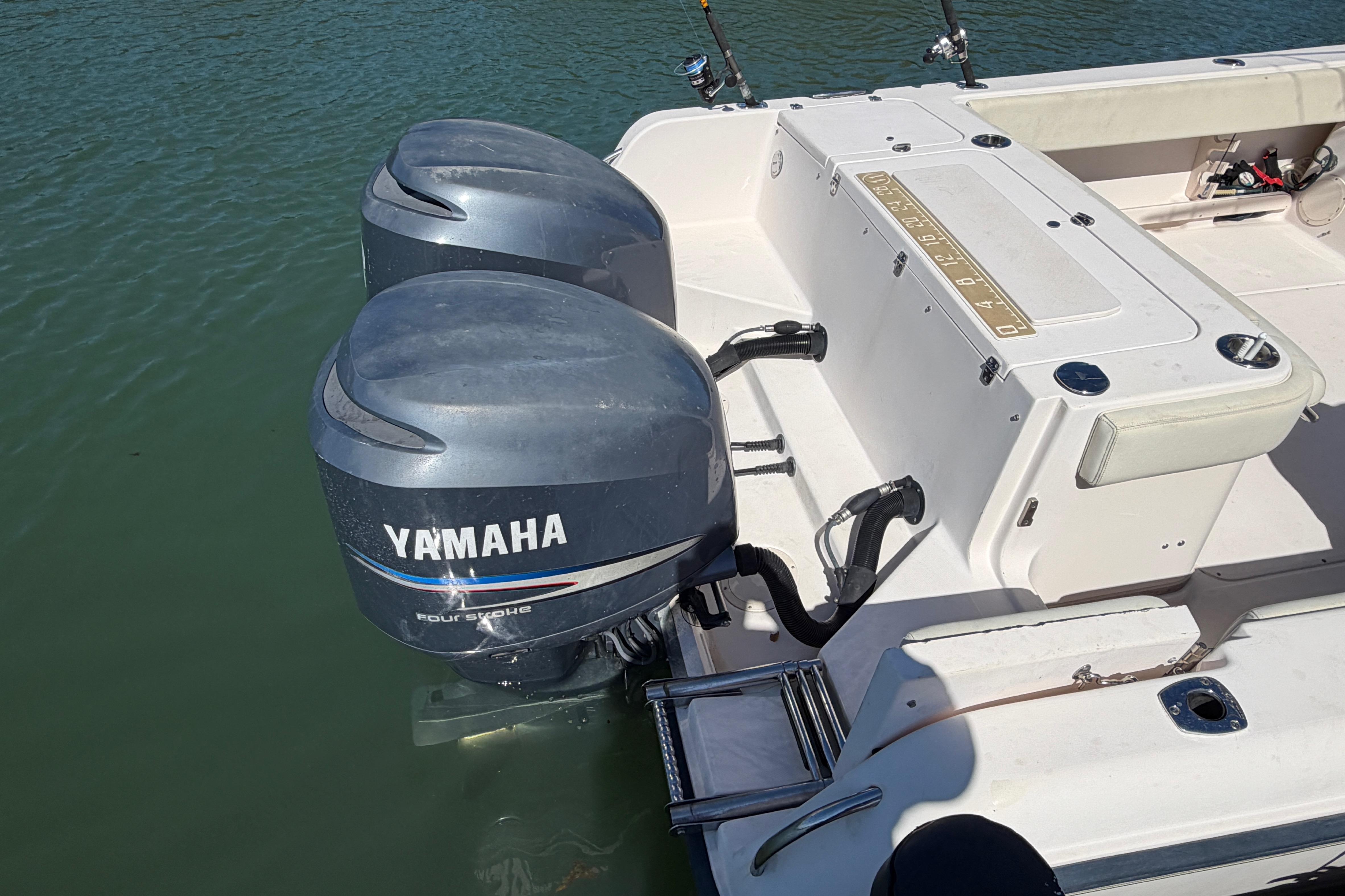 2006 Grady-White Sailfish 282 with twin Yamaha outboard motors on calm water.