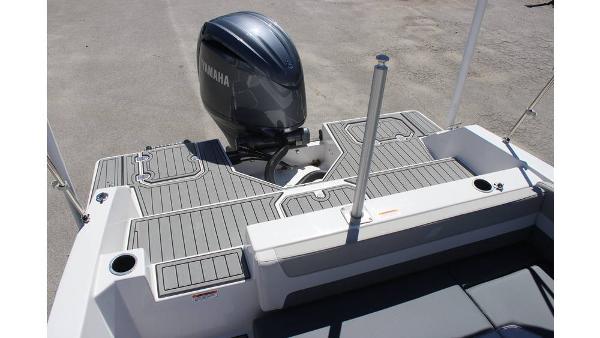 2025 Starcraft SVX 210 OB DC boat with Yamaha outboard motor, featuring a sleek deck design.