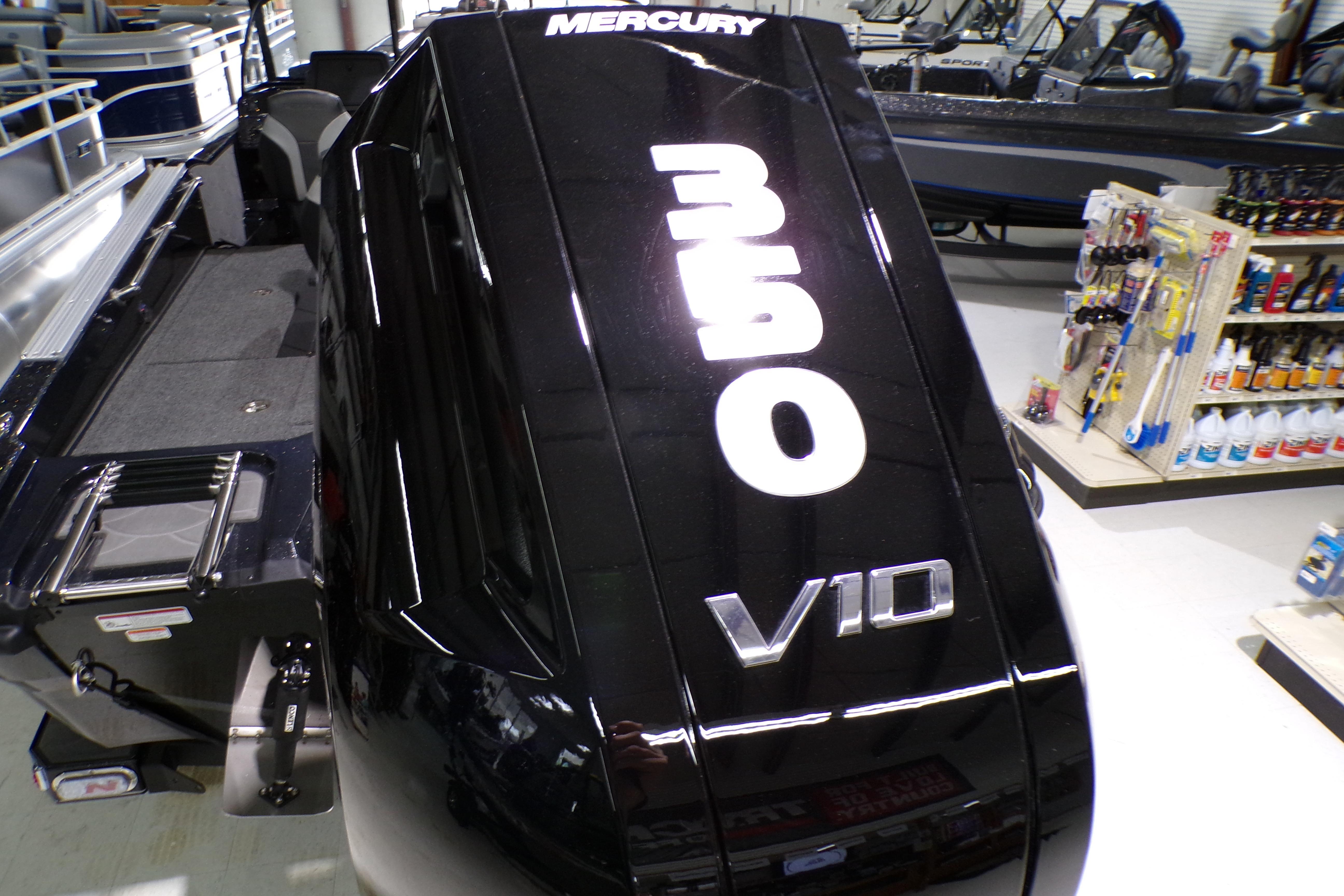 2026 Nitro ZV21 Pro boat with Mercury 350 V10 engine in showroom.