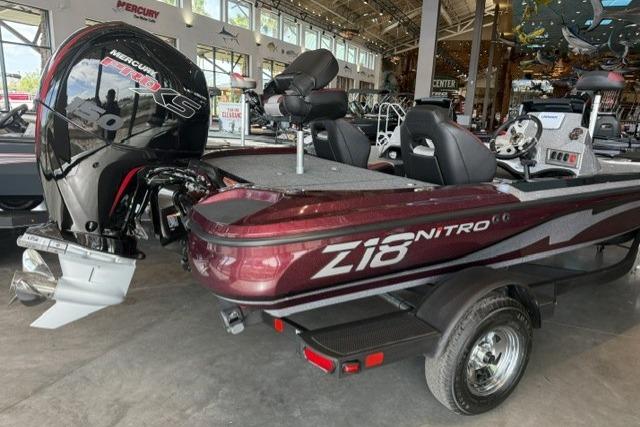 2026 Nitro Z18 boat with Mercury engine displayed in showroom.