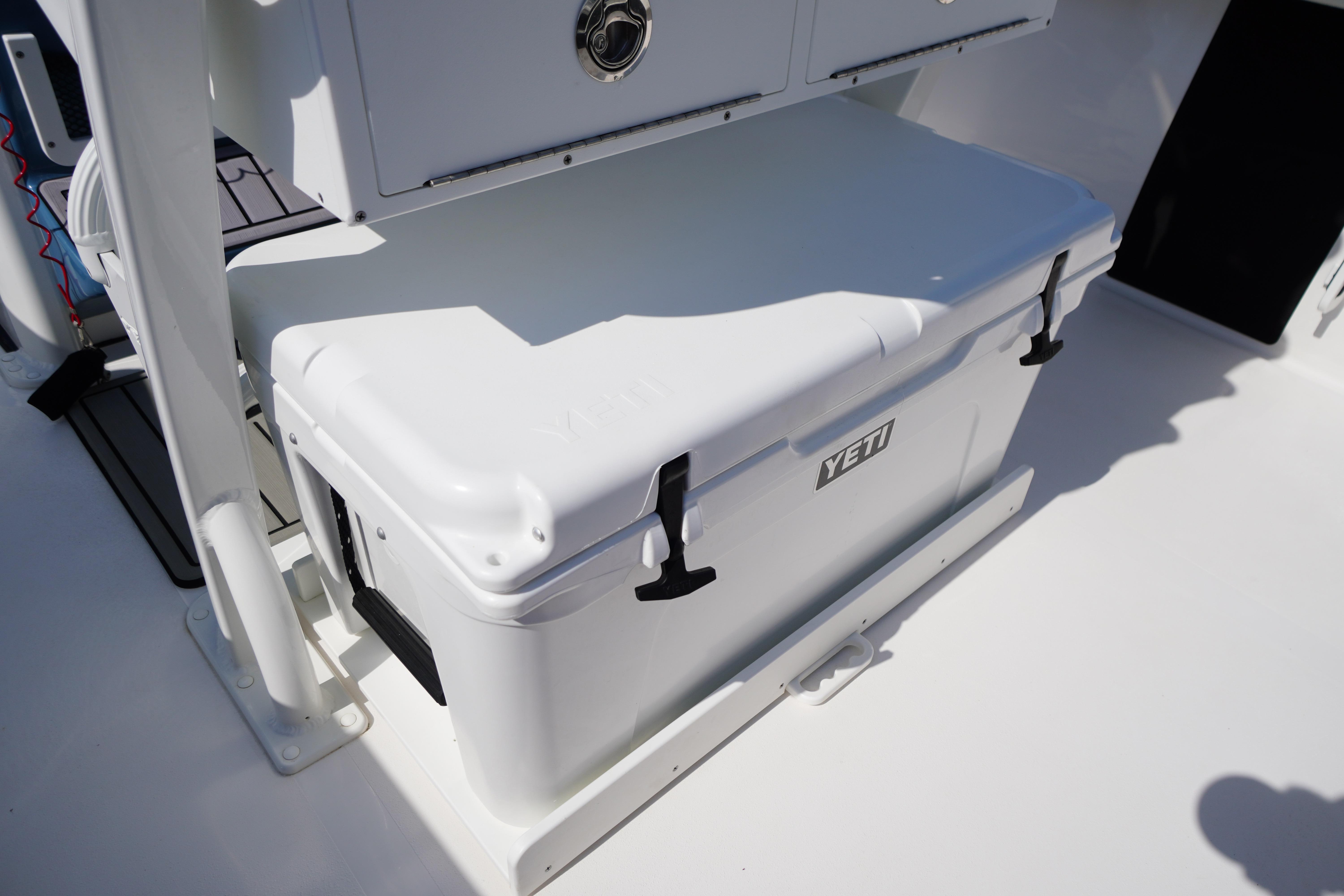 YETI cooler on 2025 Tidewater 232 SS boat deck, showcasing storage and functionality.