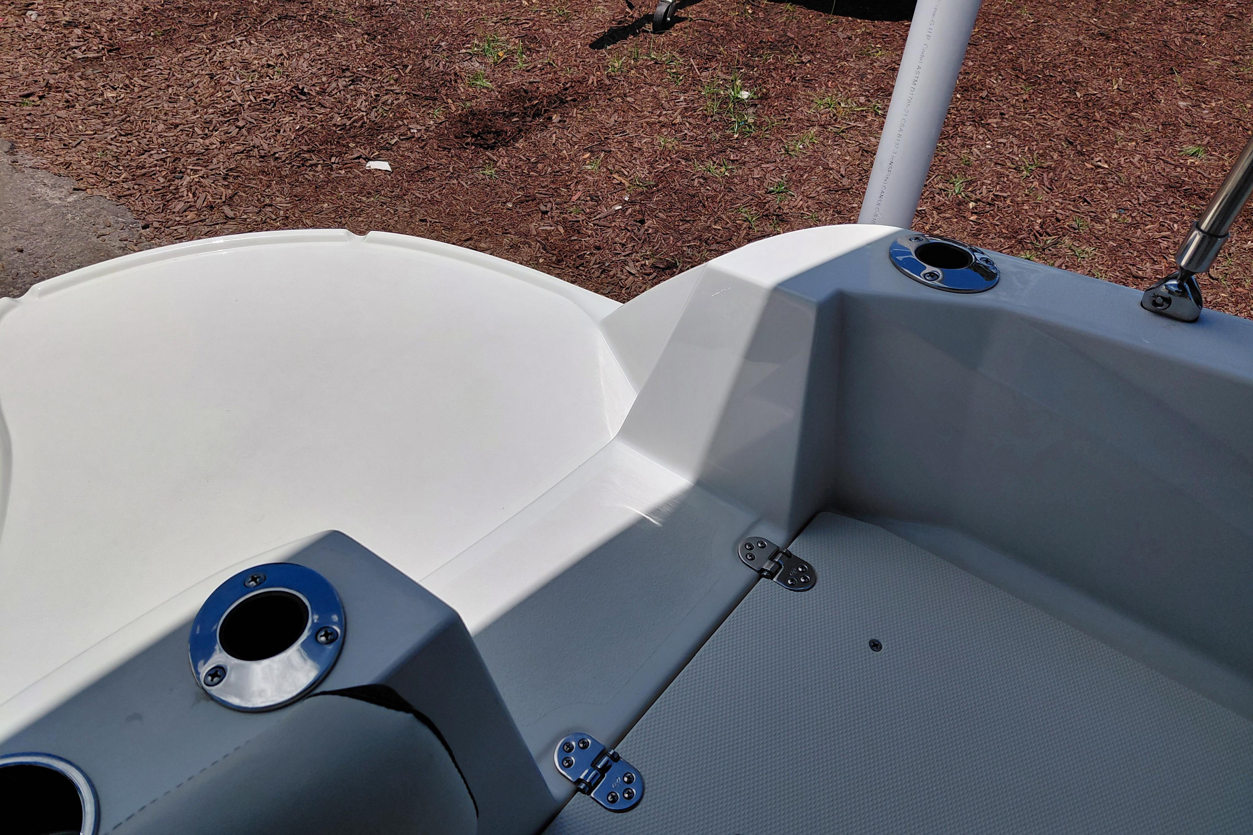 2023 Stingray 206 CC boat interior with cup holders and clean design.