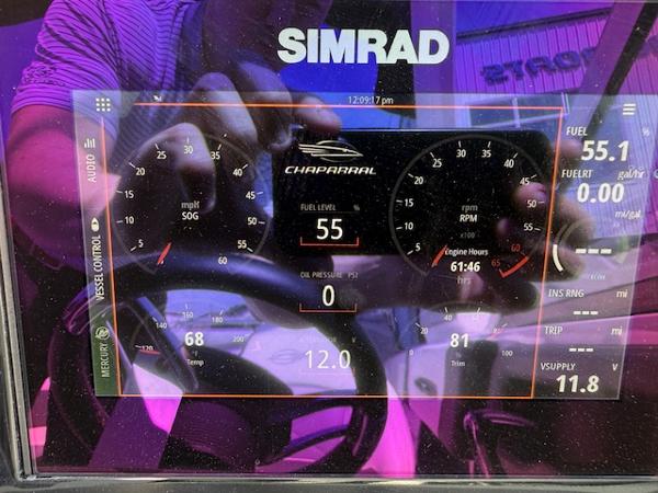 Dashboard of a 2023 Chaparral 267 SSX boat with Simrad display.