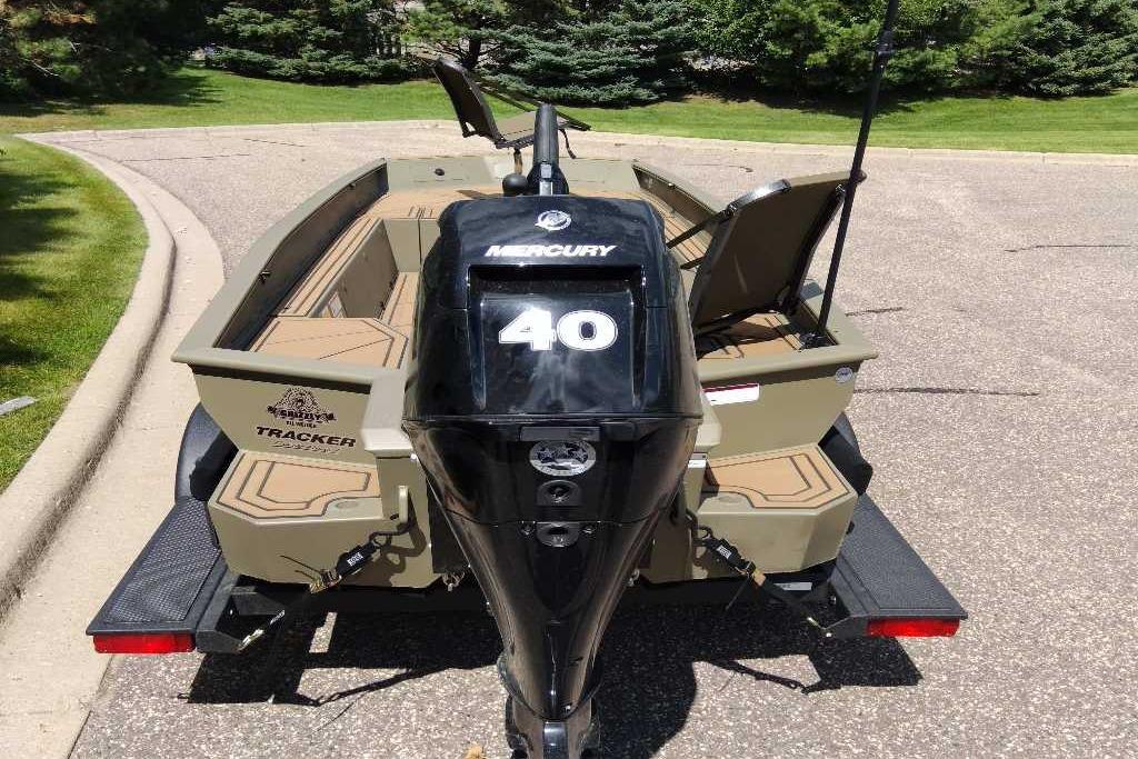 2026 Tracker Grizzly 1650 T Prairie Wings Edition boat with Mercury 40 engine.