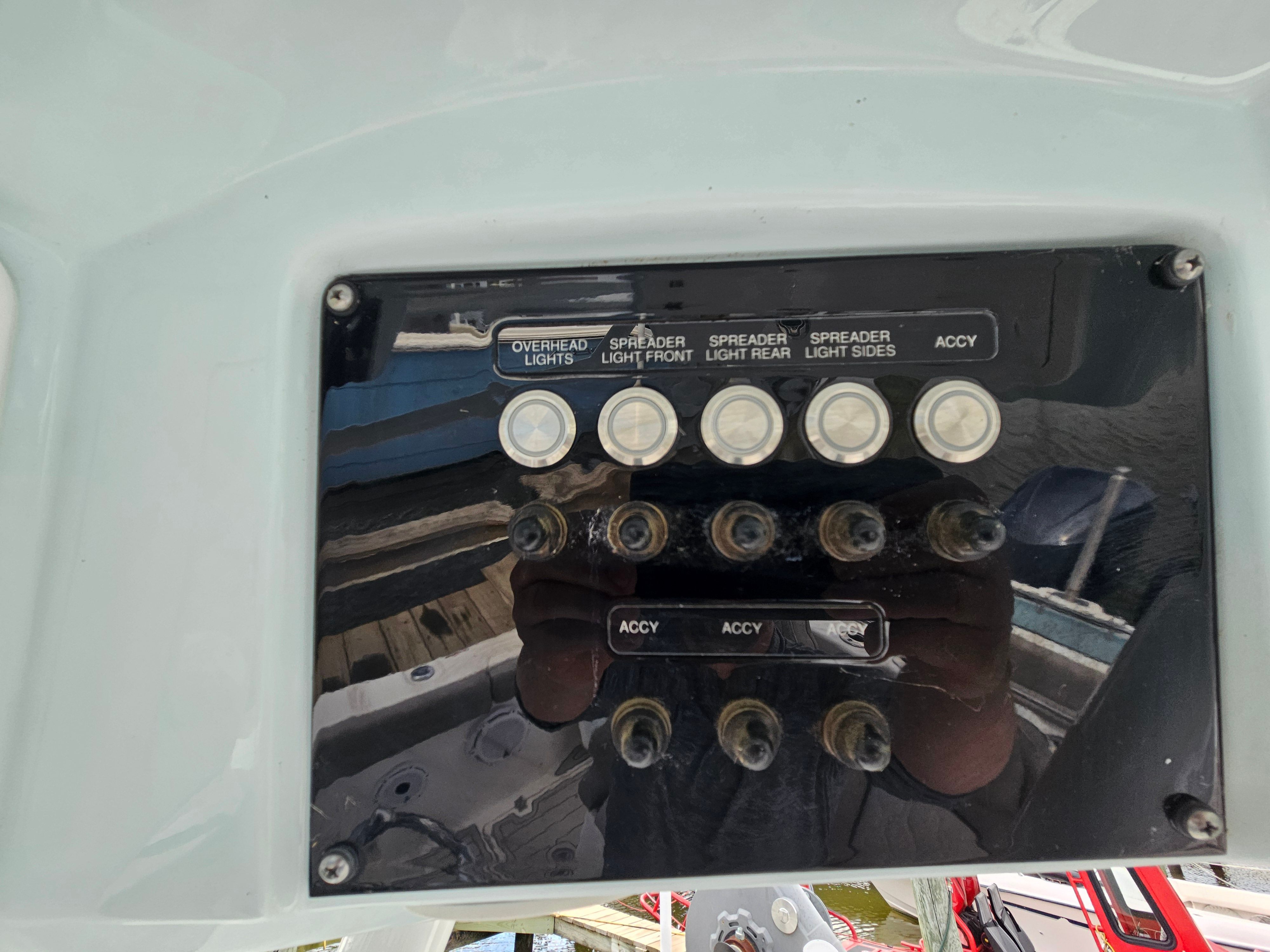 2021 Sea Fox 288 Commander switch panel with light controls.