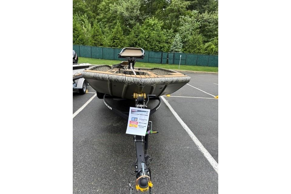 2026 Tracker Grizzly 1756 T Marsh boat on trailer in parking lot.