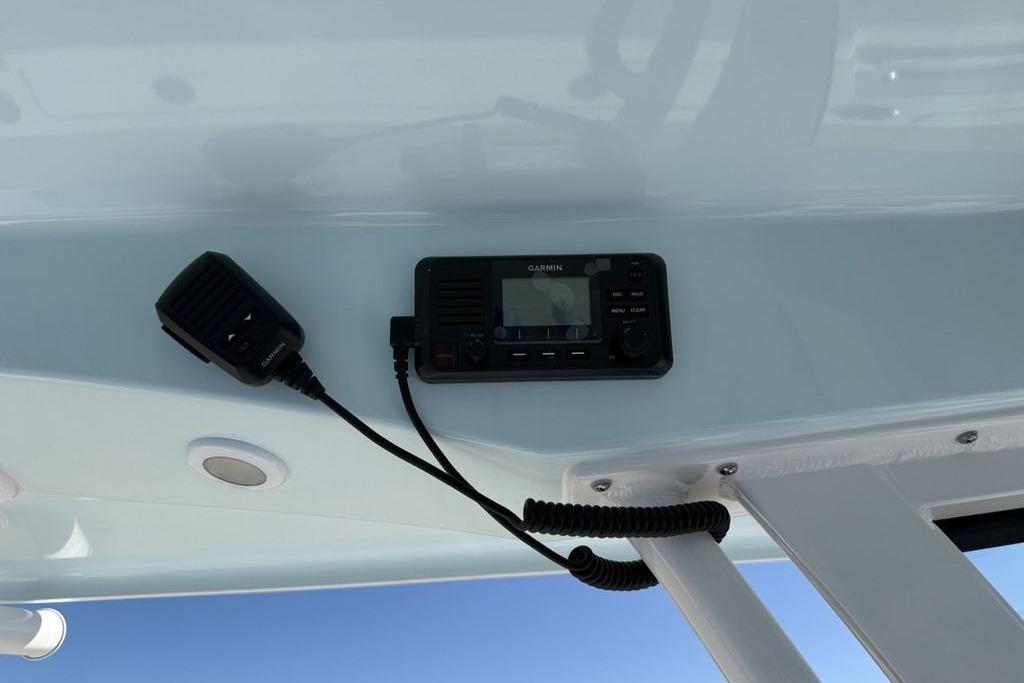 2026 Sportsman Open 232 Center Console with Garmin marine radio installed.