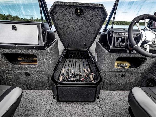 2026 Lund 1875 Impact XS boat interior with rod storage compartment open.