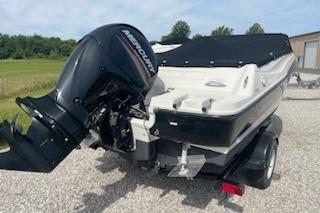 2013 Bayliner 190 Bowrider with Mercury outboard engine on a trailer.