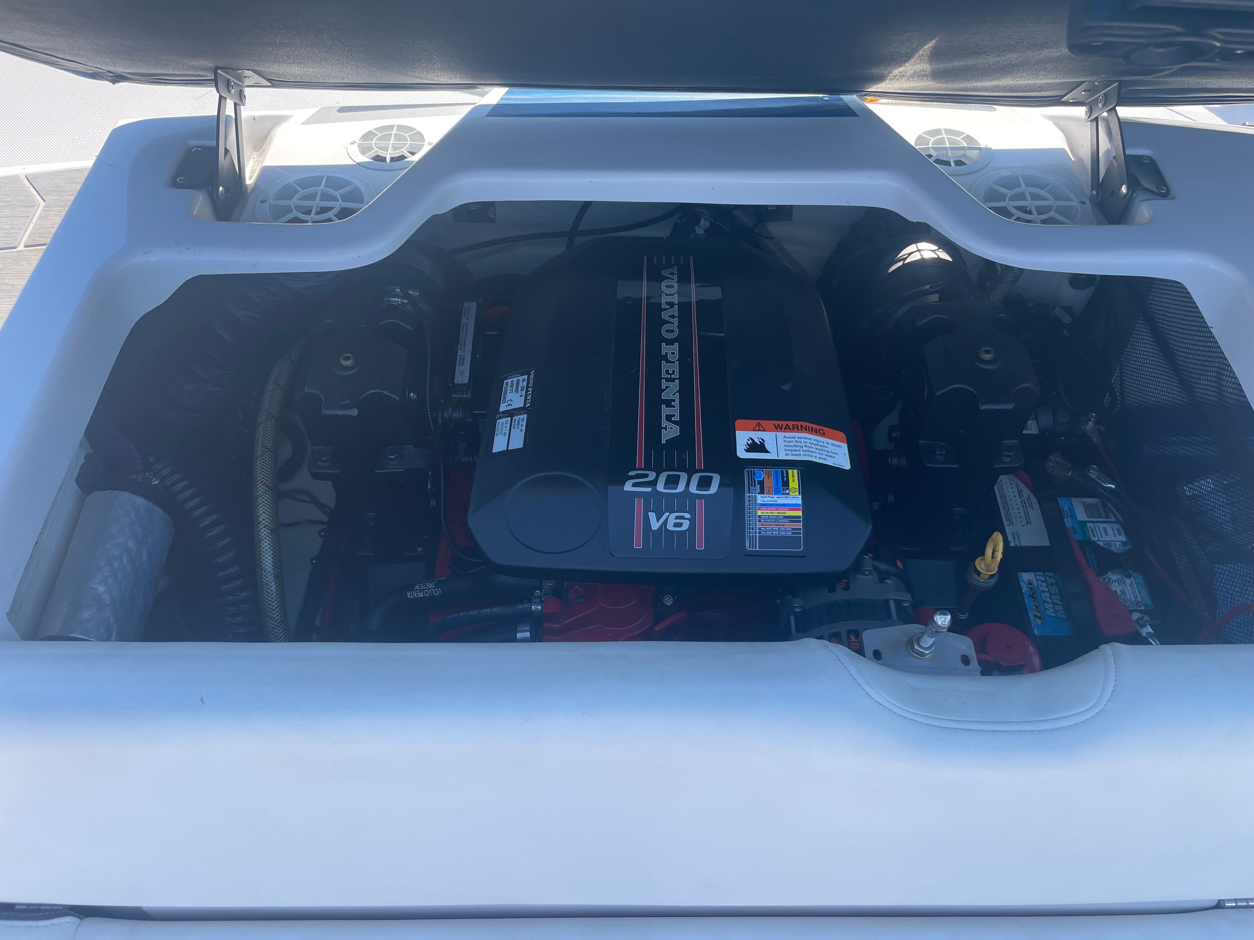 Engine compartment of a 2016 Regal 1900 ESX Bowrider with a 200 HP V6 engine.