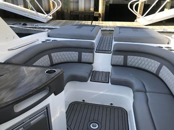 2020 Rinker 29QX BR boat with spacious seating and modern interior design.