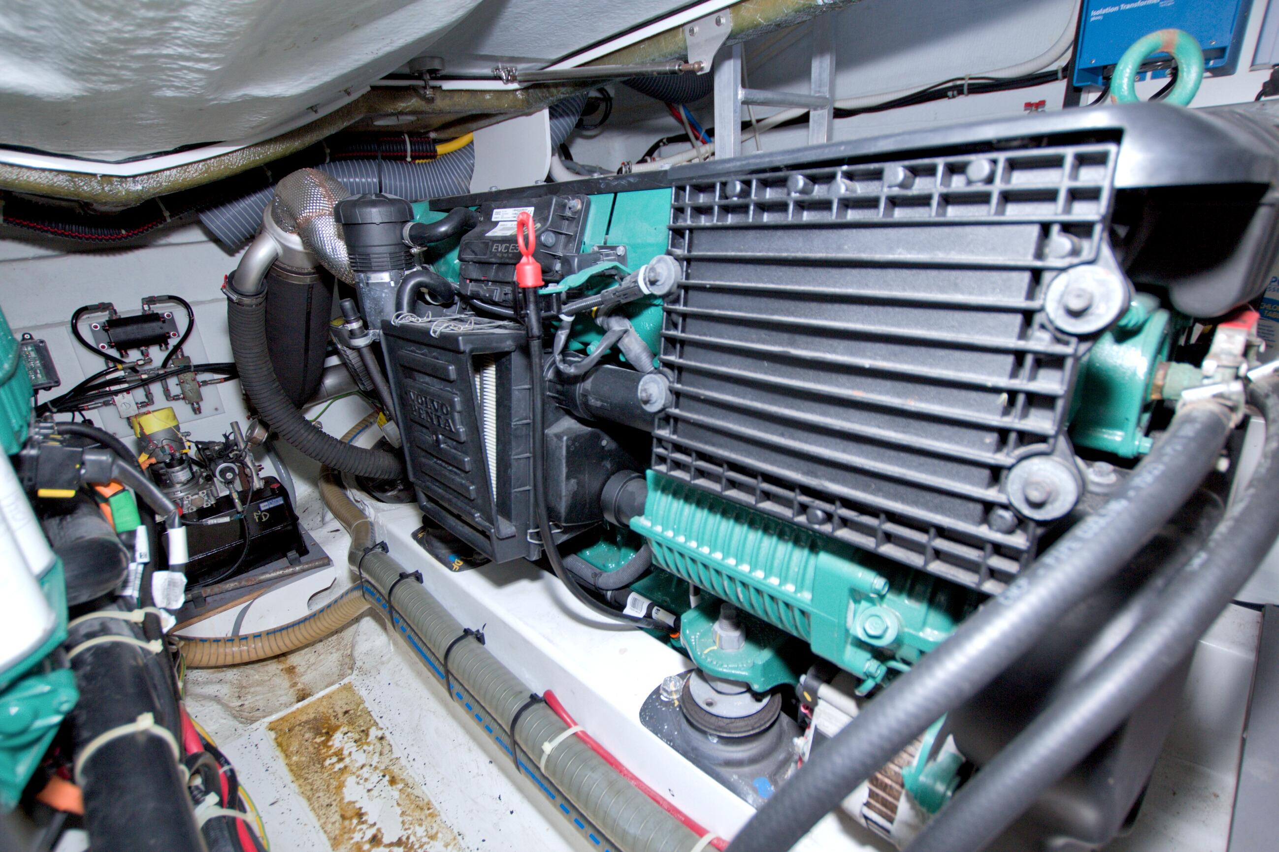 Engine room of 2019 Beneteau Gran Turismo 50 yacht, showcasing mechanical components.