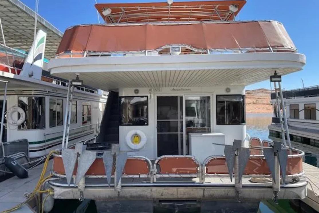 Houseboat docked at marina, American Waterways Sundancer Trip #15, 2007 model.