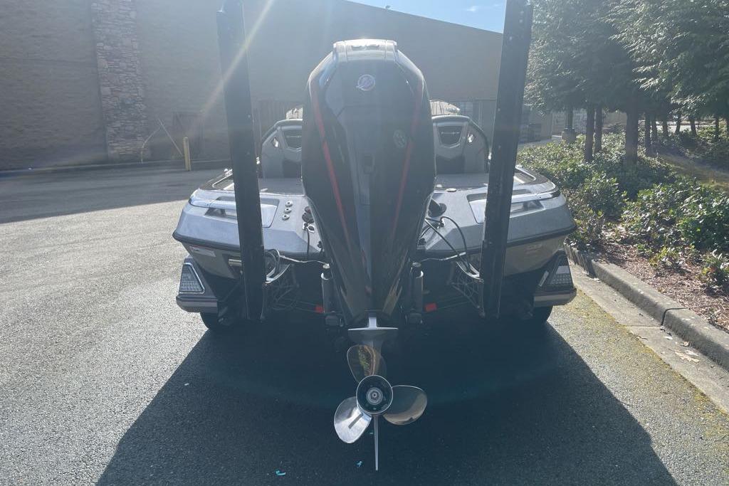 2025 Ranger Z520R Cup-Equipped boat, rear view, parked outdoors.