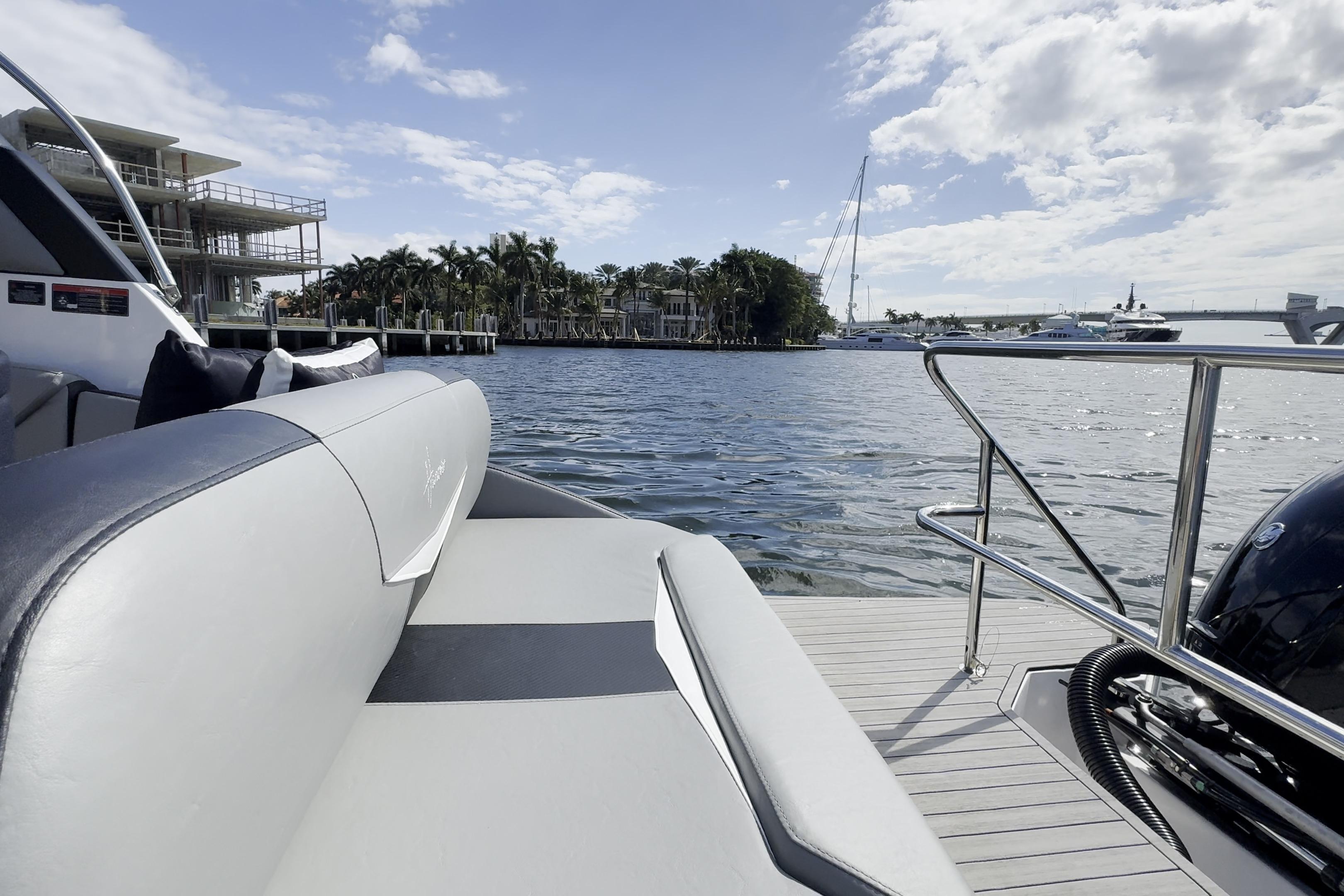 Luxurious Hanover 305 boat interior with waterfront view, 2027 model.